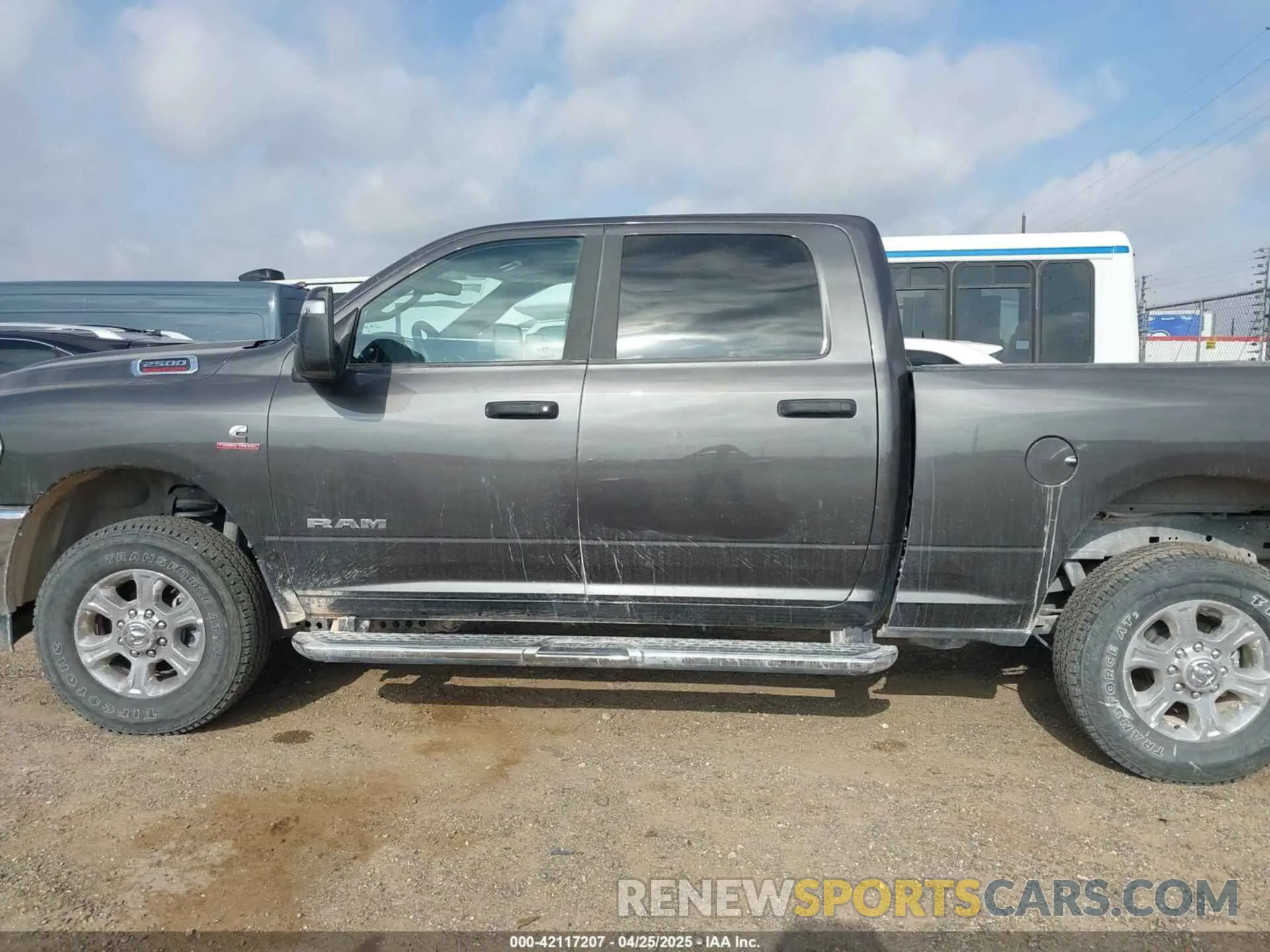 14 Photograph of a damaged car 3C6UR5DL8RG336343 RAM 2500 2024