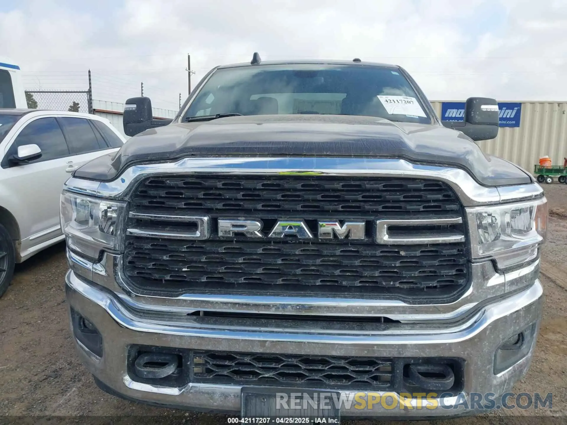 6 Photograph of a damaged car 3C6UR5DL8RG336343 RAM 2500 2024