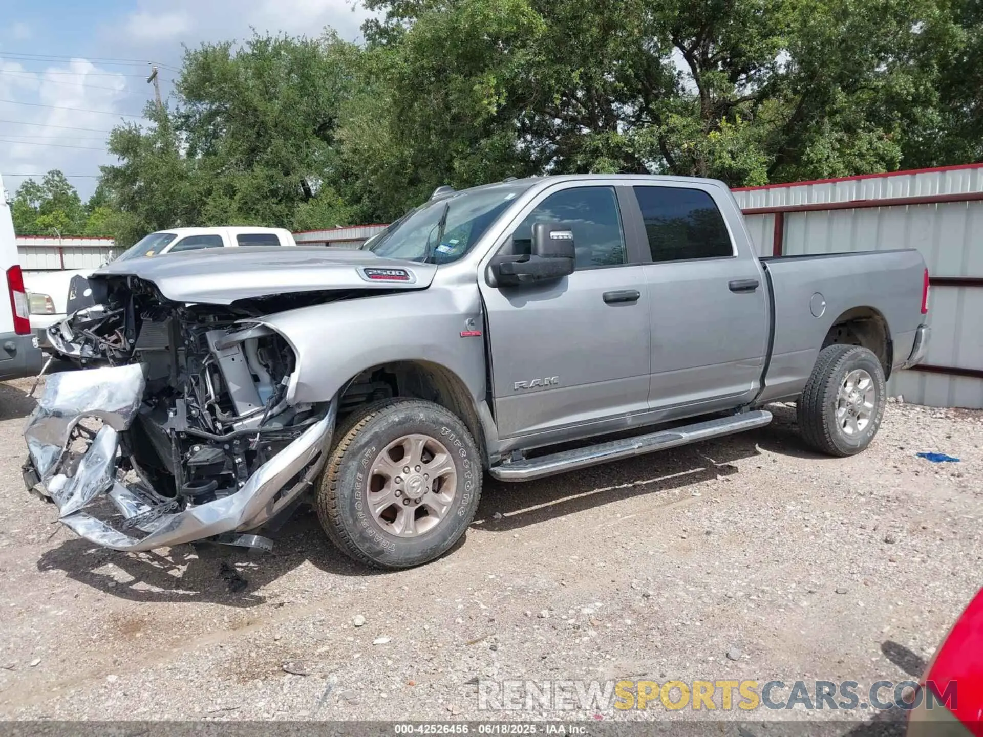 15 Photograph of a damaged car 3C6UR5DL8RG343566 RAM 2500 2024