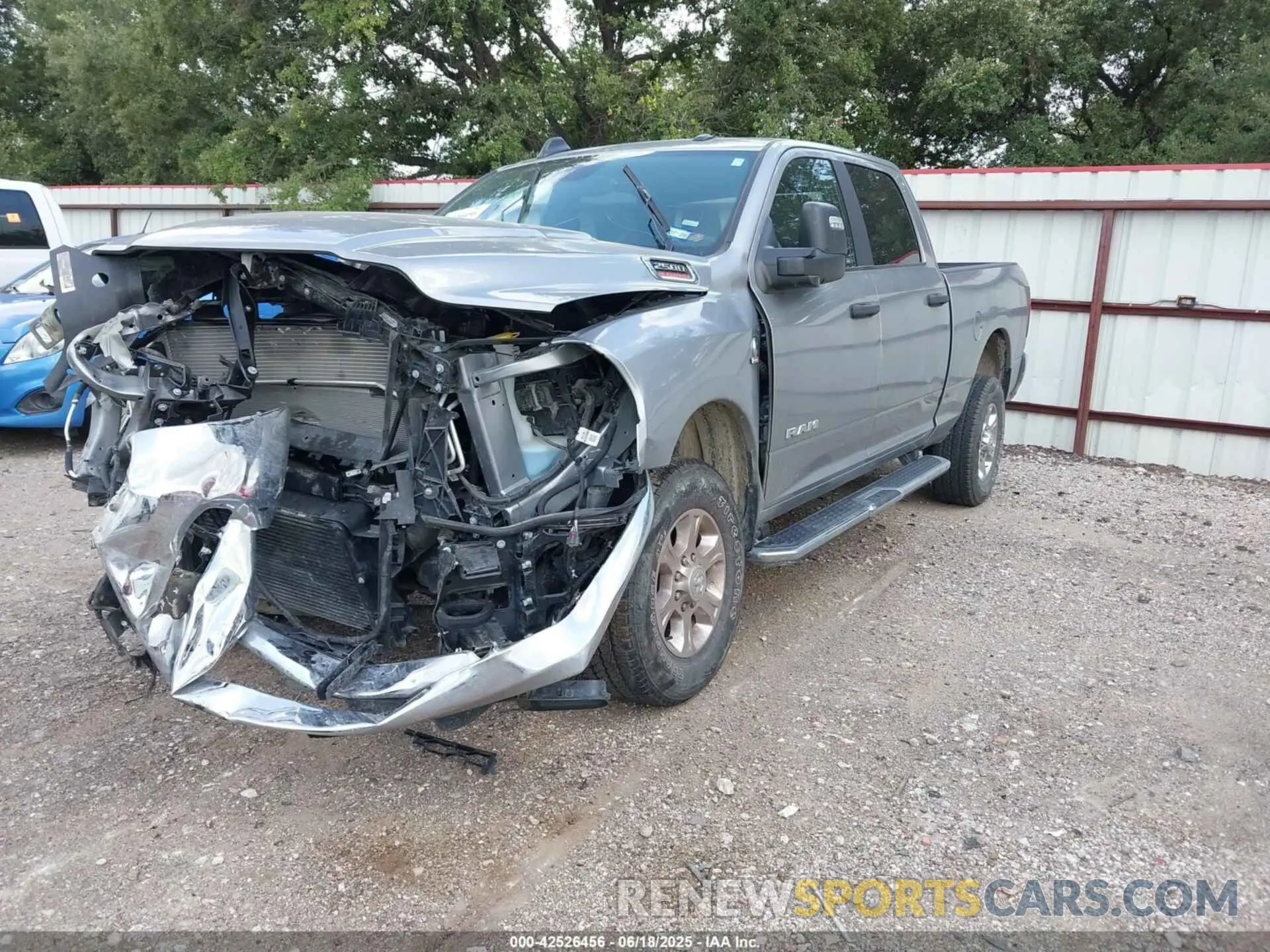 2 Photograph of a damaged car 3C6UR5DL8RG343566 RAM 2500 2024