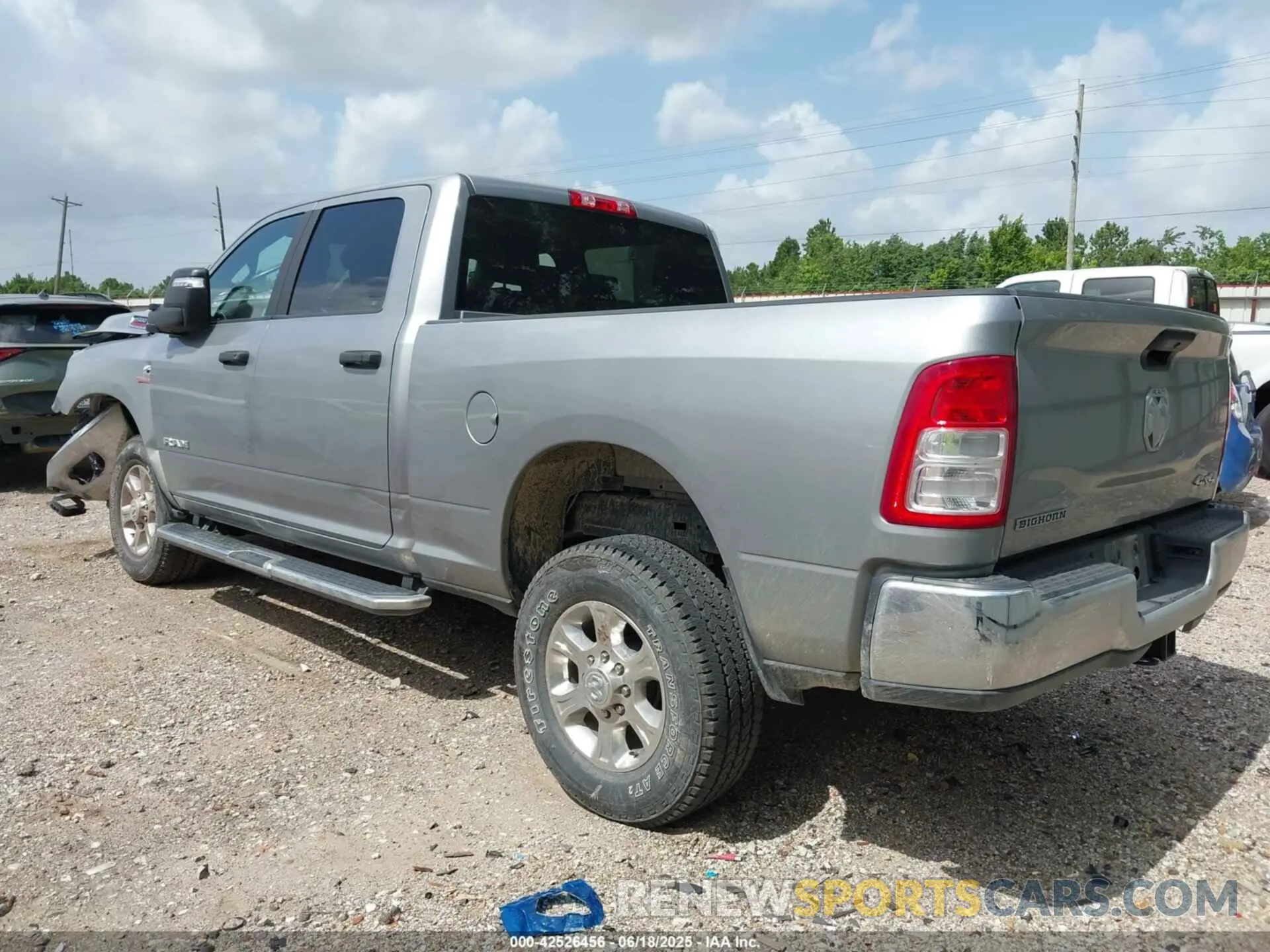 3 Photograph of a damaged car 3C6UR5DL8RG343566 RAM 2500 2024