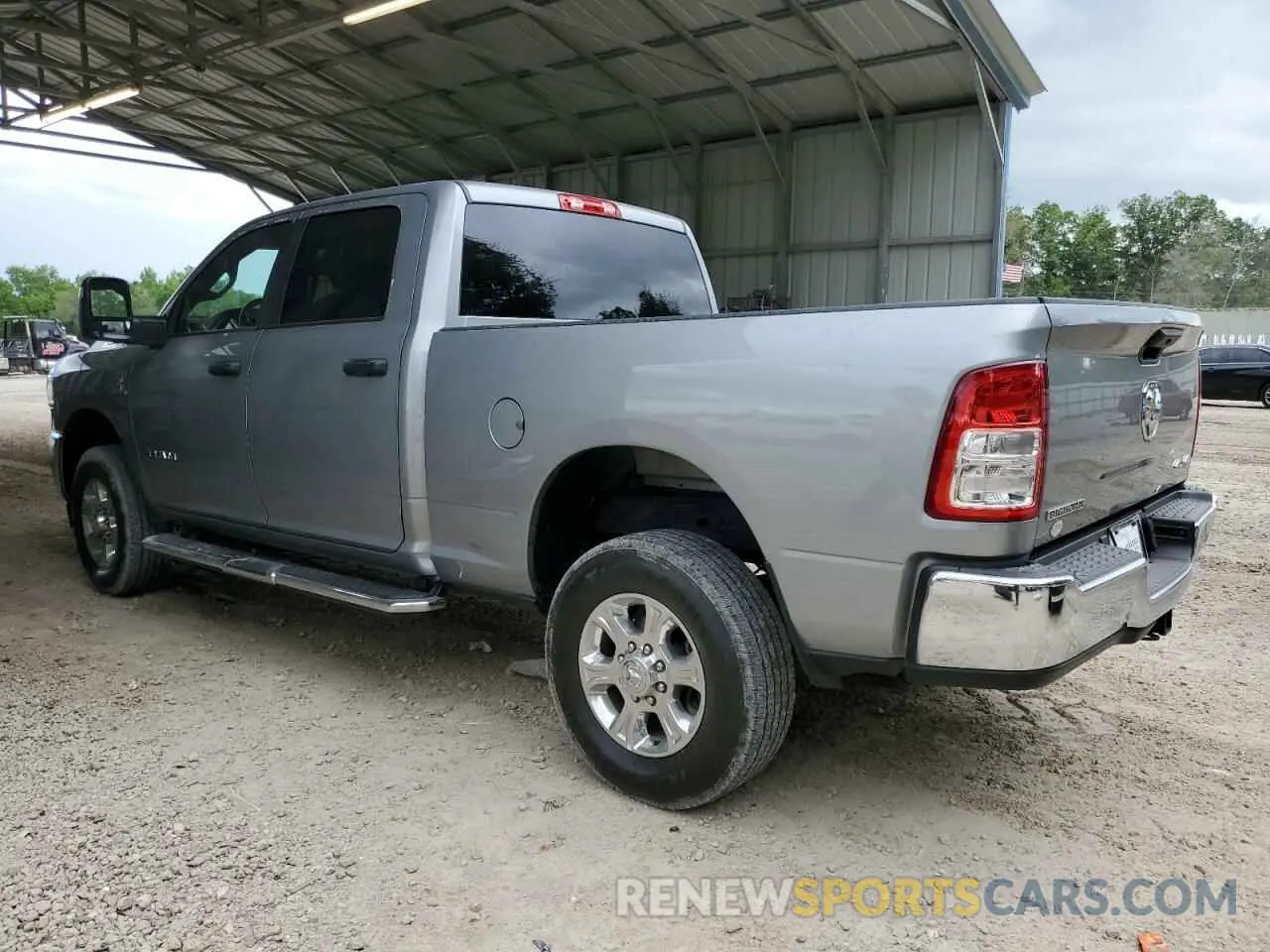 2 Photograph of a damaged car 3C6UR5DL9RG154148 RAM 2500 2024