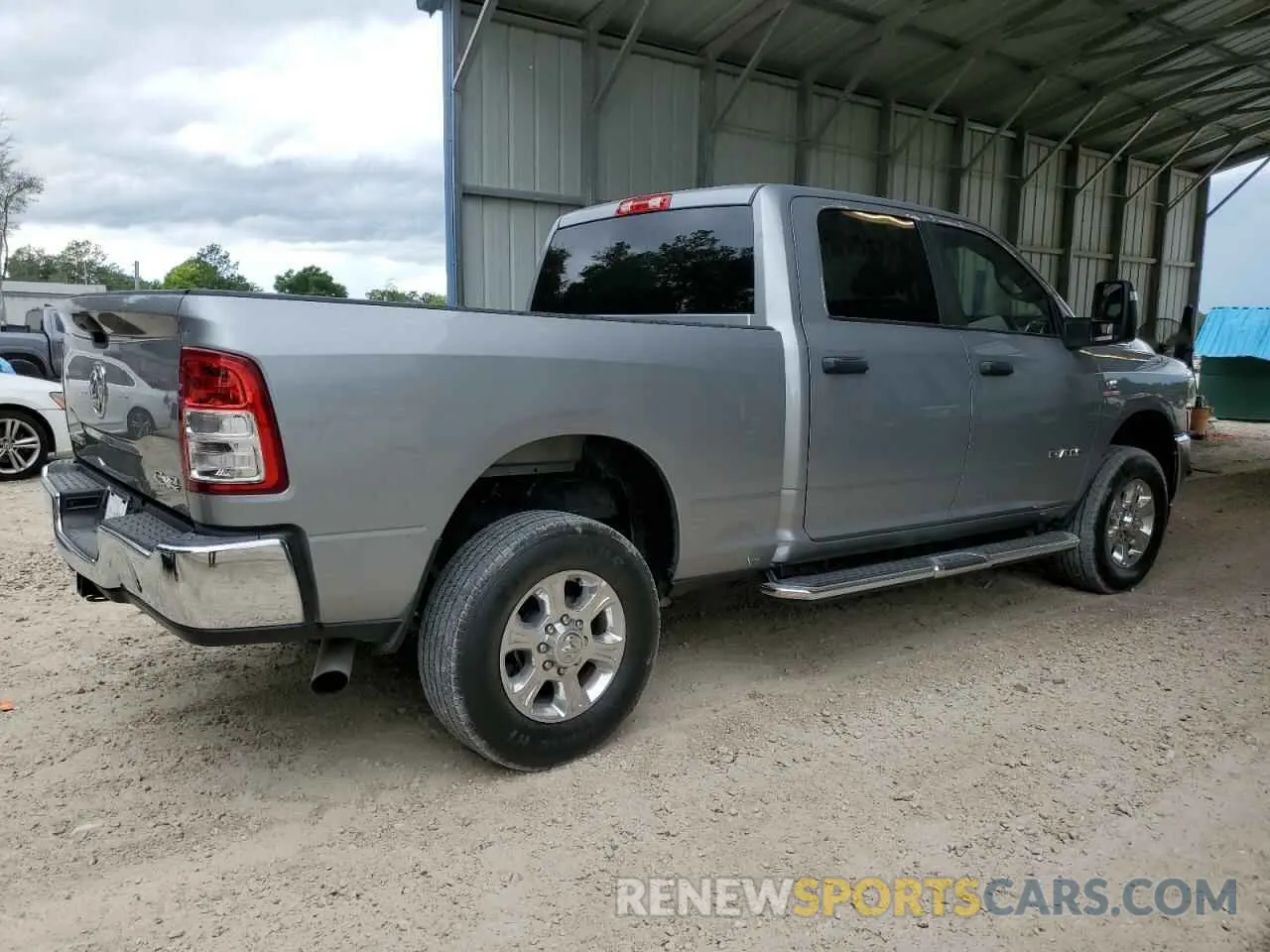 3 Photograph of a damaged car 3C6UR5DL9RG154148 RAM 2500 2024