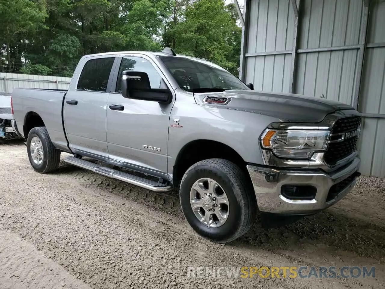 4 Photograph of a damaged car 3C6UR5DL9RG154148 RAM 2500 2024