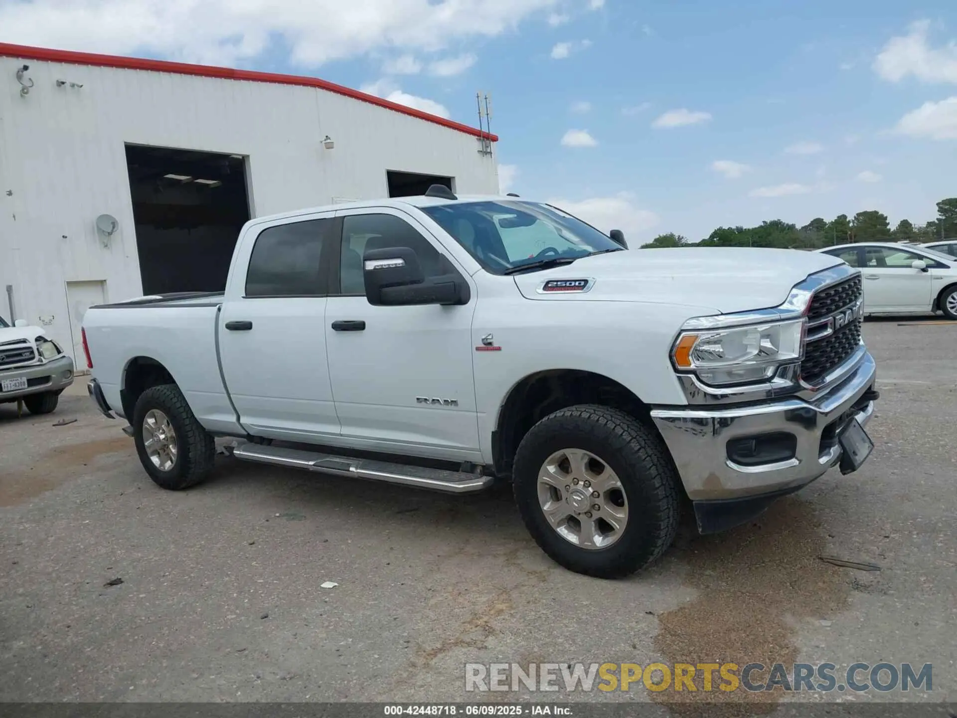 13 Photograph of a damaged car 3C6UR5DL9RG154280 RAM 2500 2024