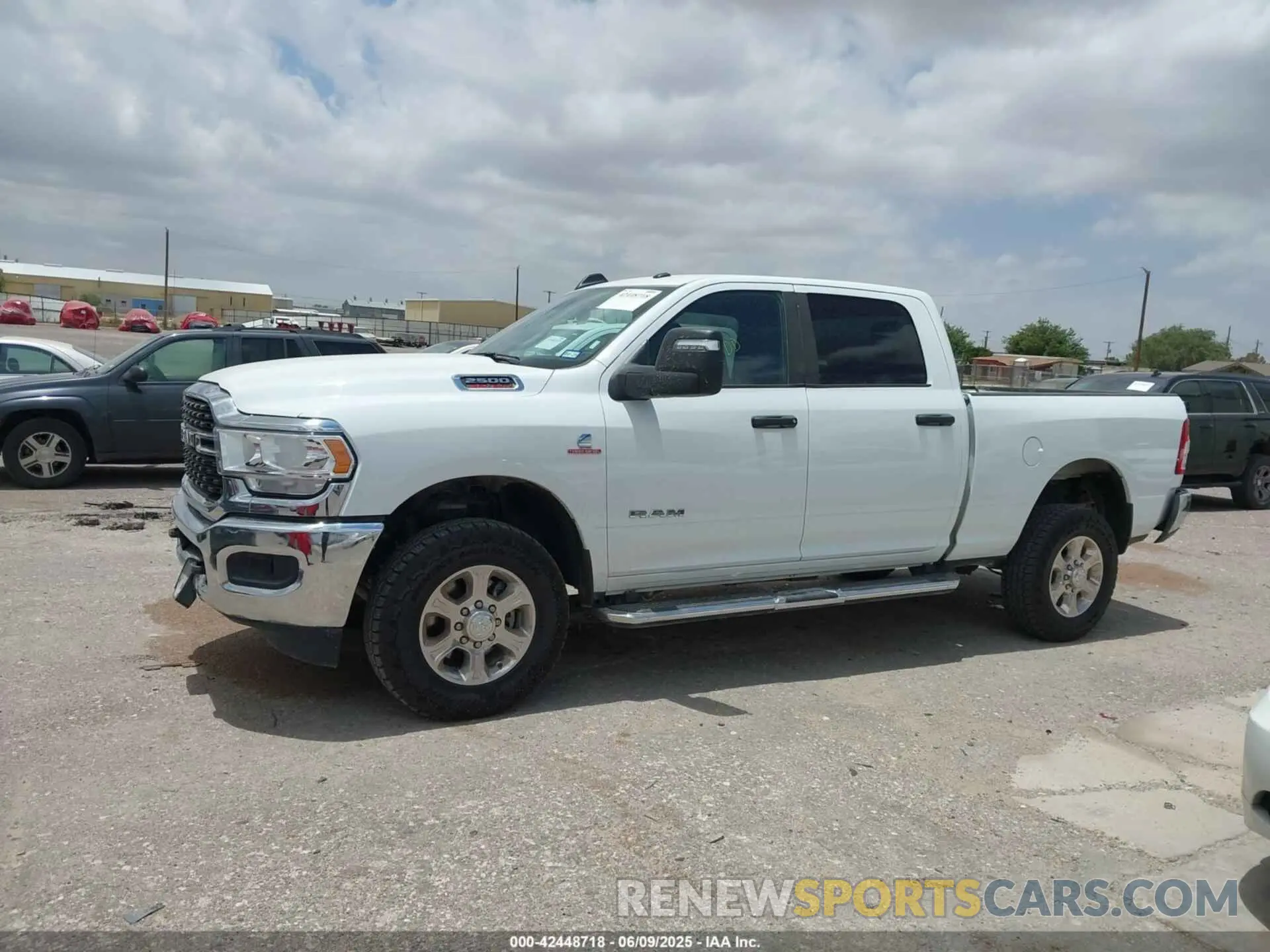 14 Photograph of a damaged car 3C6UR5DL9RG154280 RAM 2500 2024