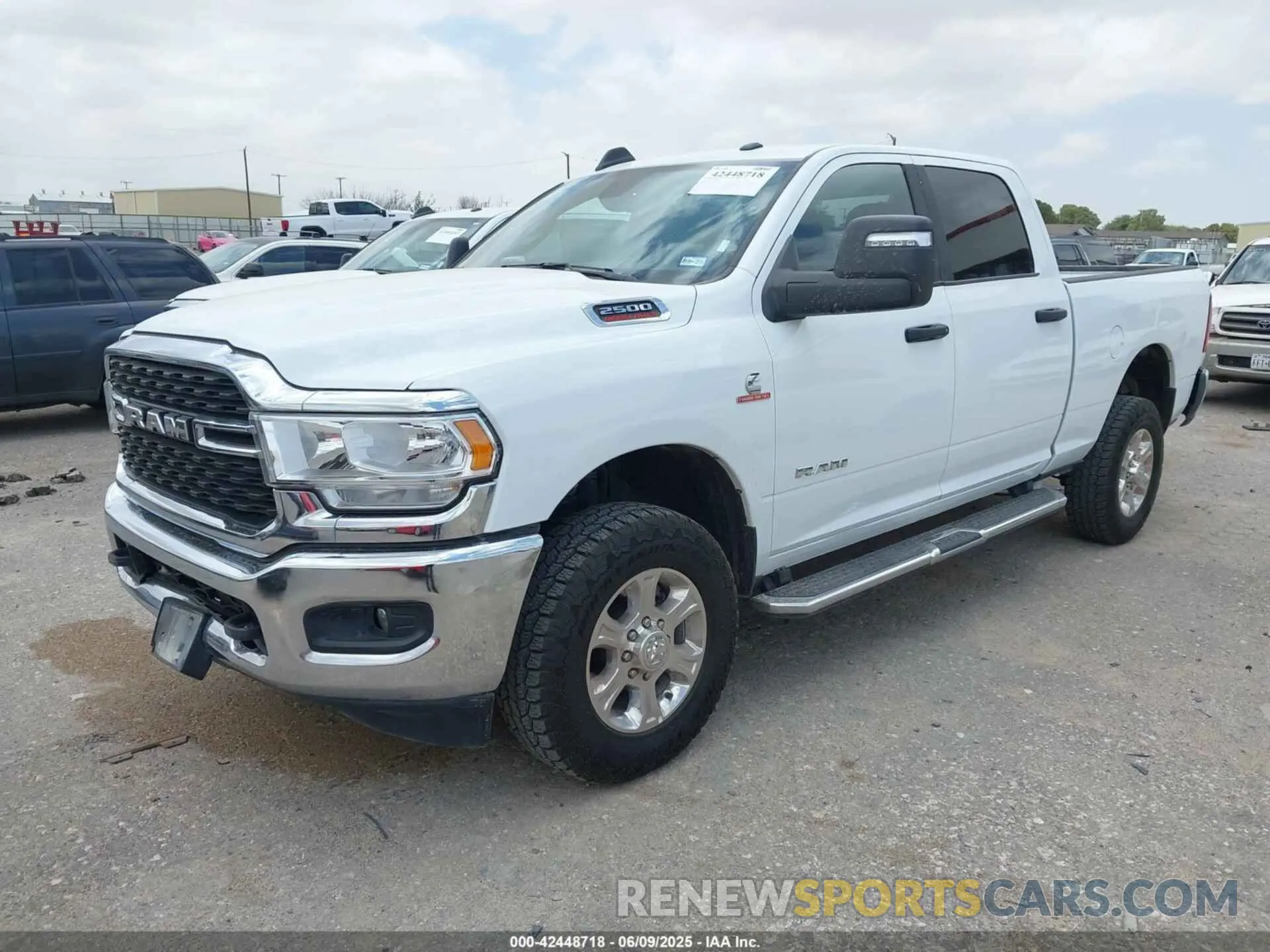 2 Photograph of a damaged car 3C6UR5DL9RG154280 RAM 2500 2024
