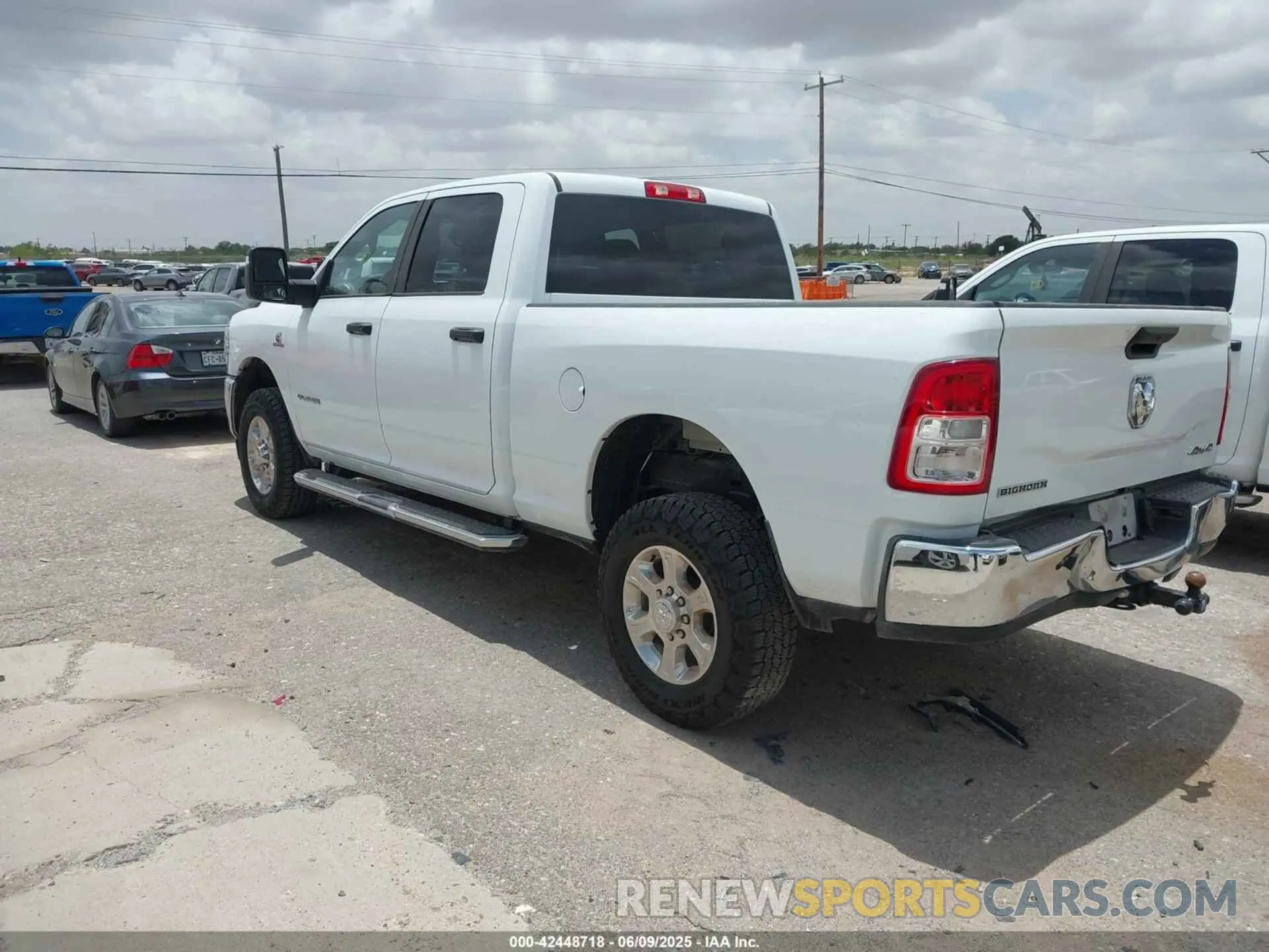 3 Photograph of a damaged car 3C6UR5DL9RG154280 RAM 2500 2024