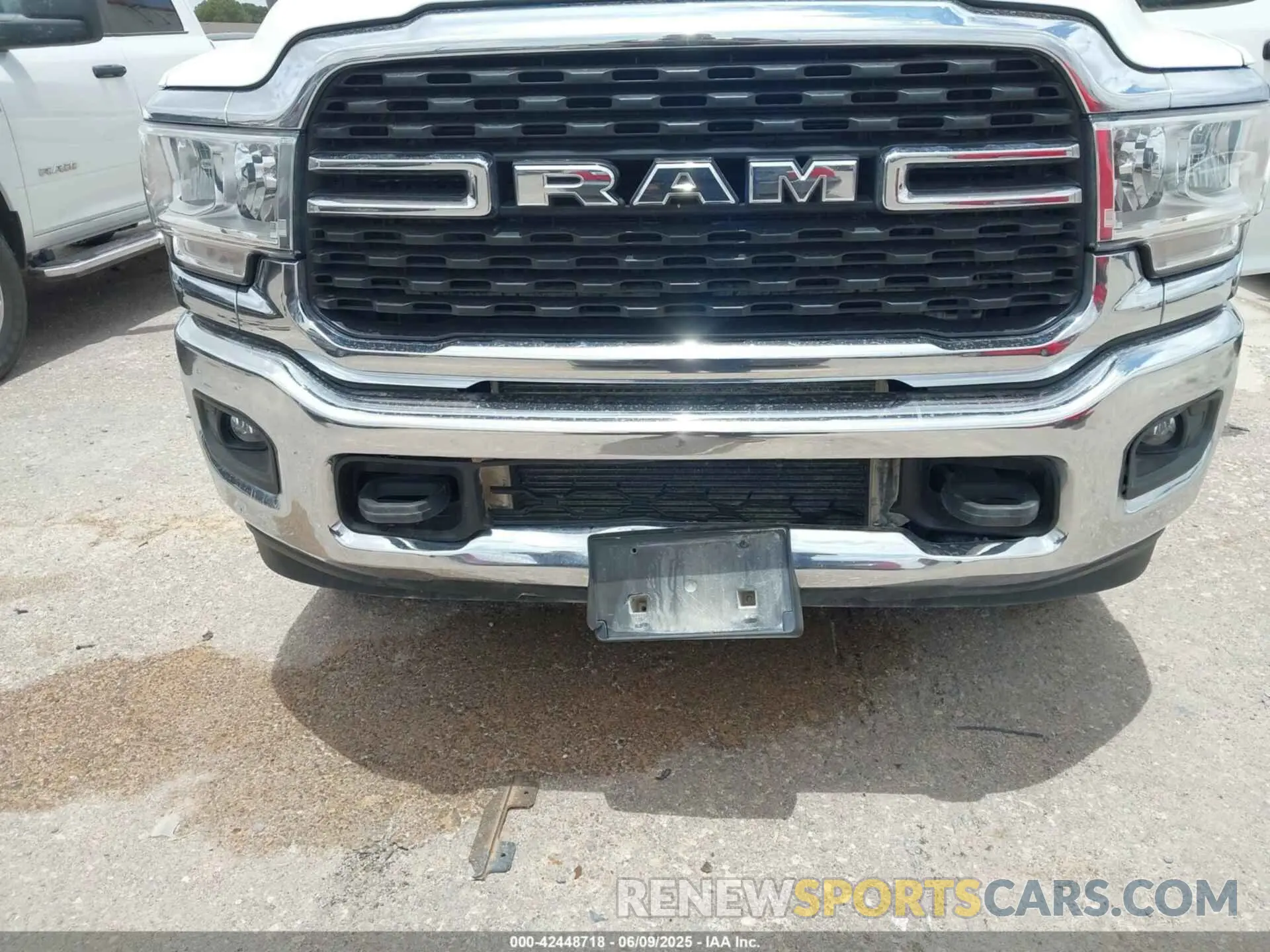 6 Photograph of a damaged car 3C6UR5DL9RG154280 RAM 2500 2024