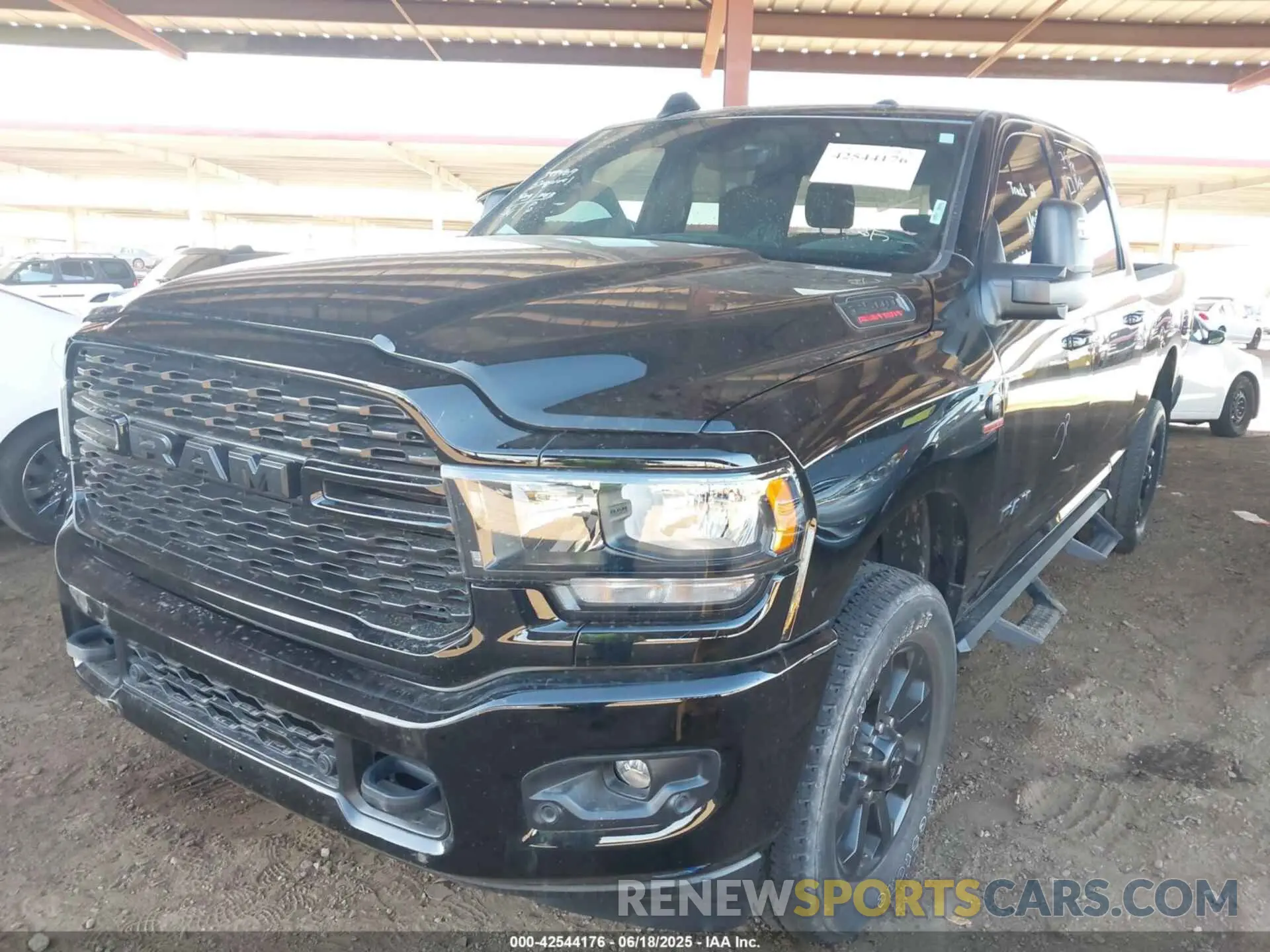 6 Photograph of a damaged car 3C6UR5DL9RG222903 RAM 2500 2024