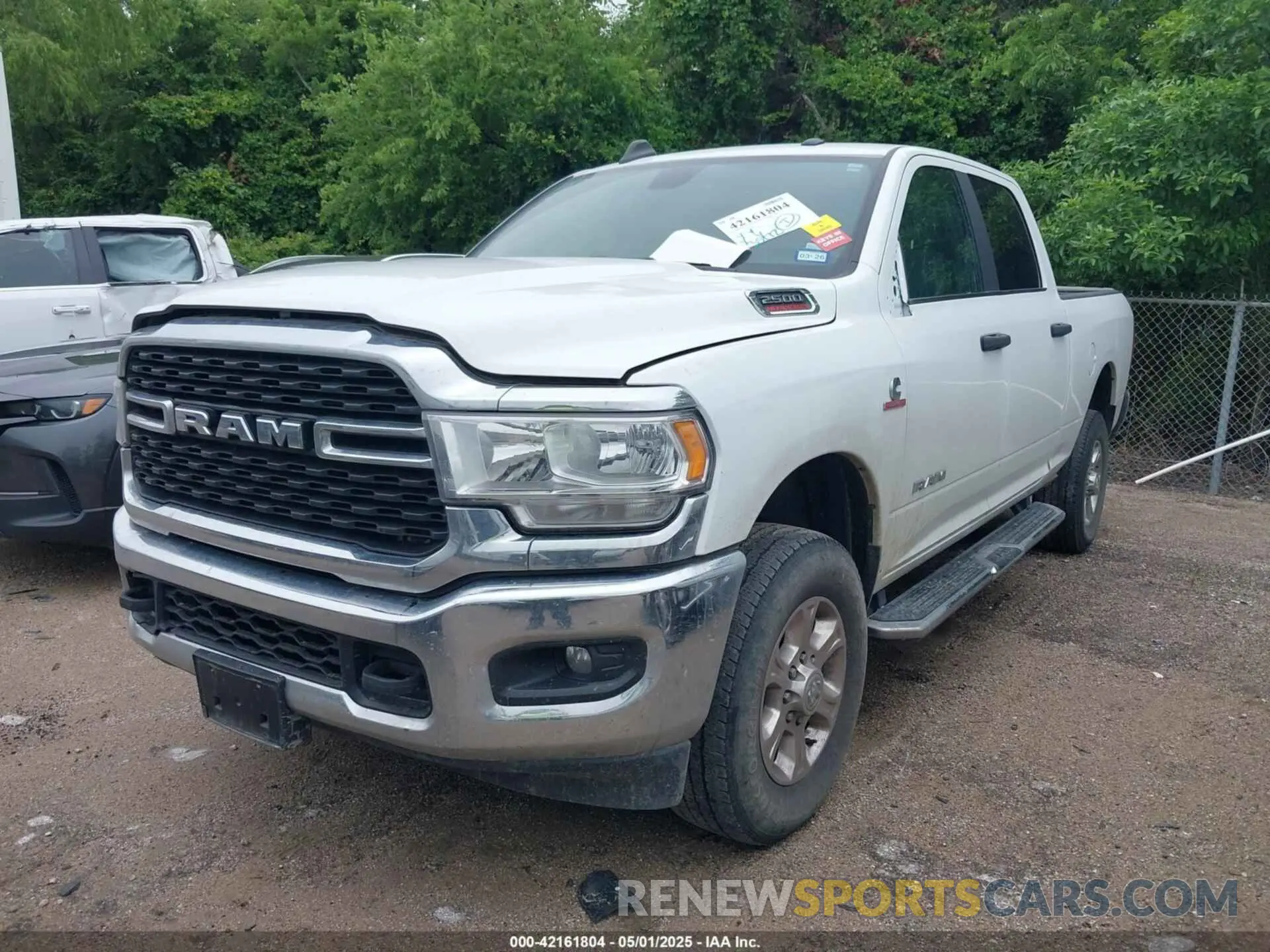 2 Photograph of a damaged car 3C6UR5DL9RG283488 RAM 2500 2024
