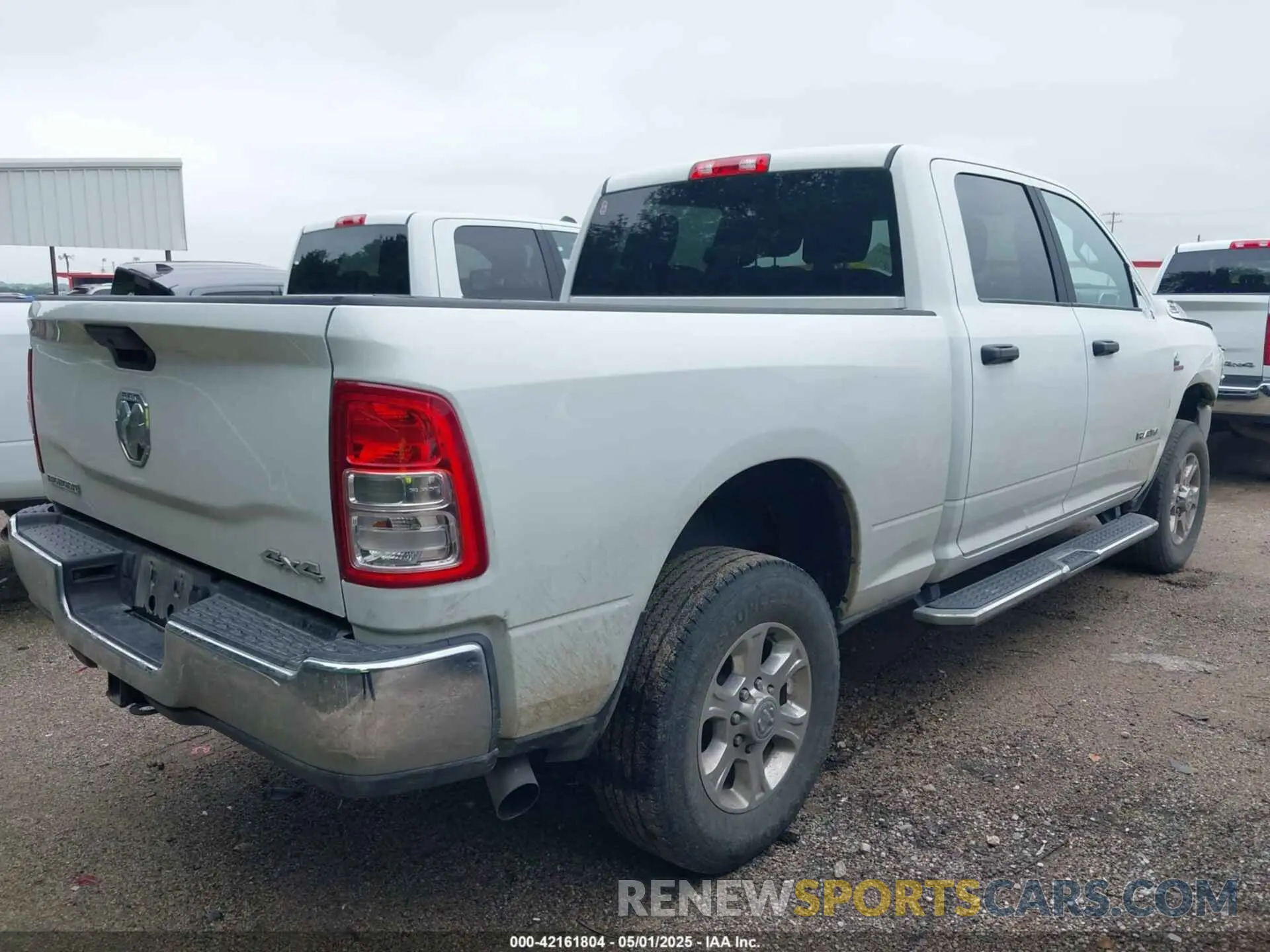 4 Photograph of a damaged car 3C6UR5DL9RG283488 RAM 2500 2024