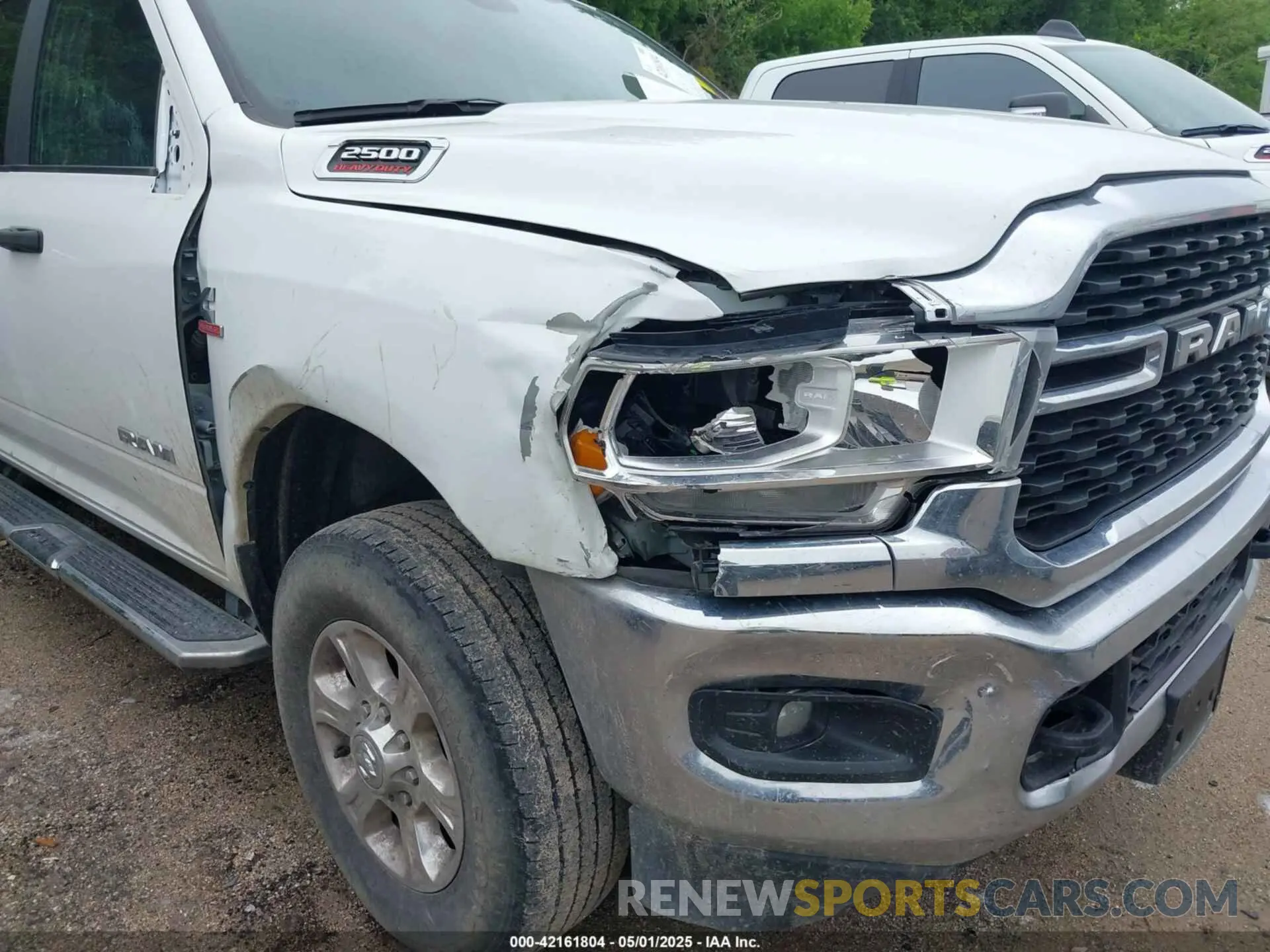 6 Photograph of a damaged car 3C6UR5DL9RG283488 RAM 2500 2024