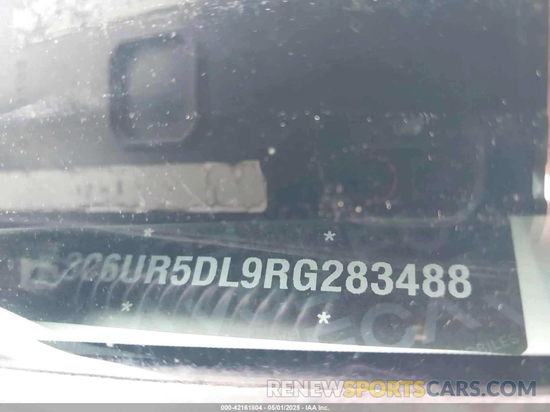 9 Photograph of a damaged car 3C6UR5DL9RG283488 RAM 2500 2024