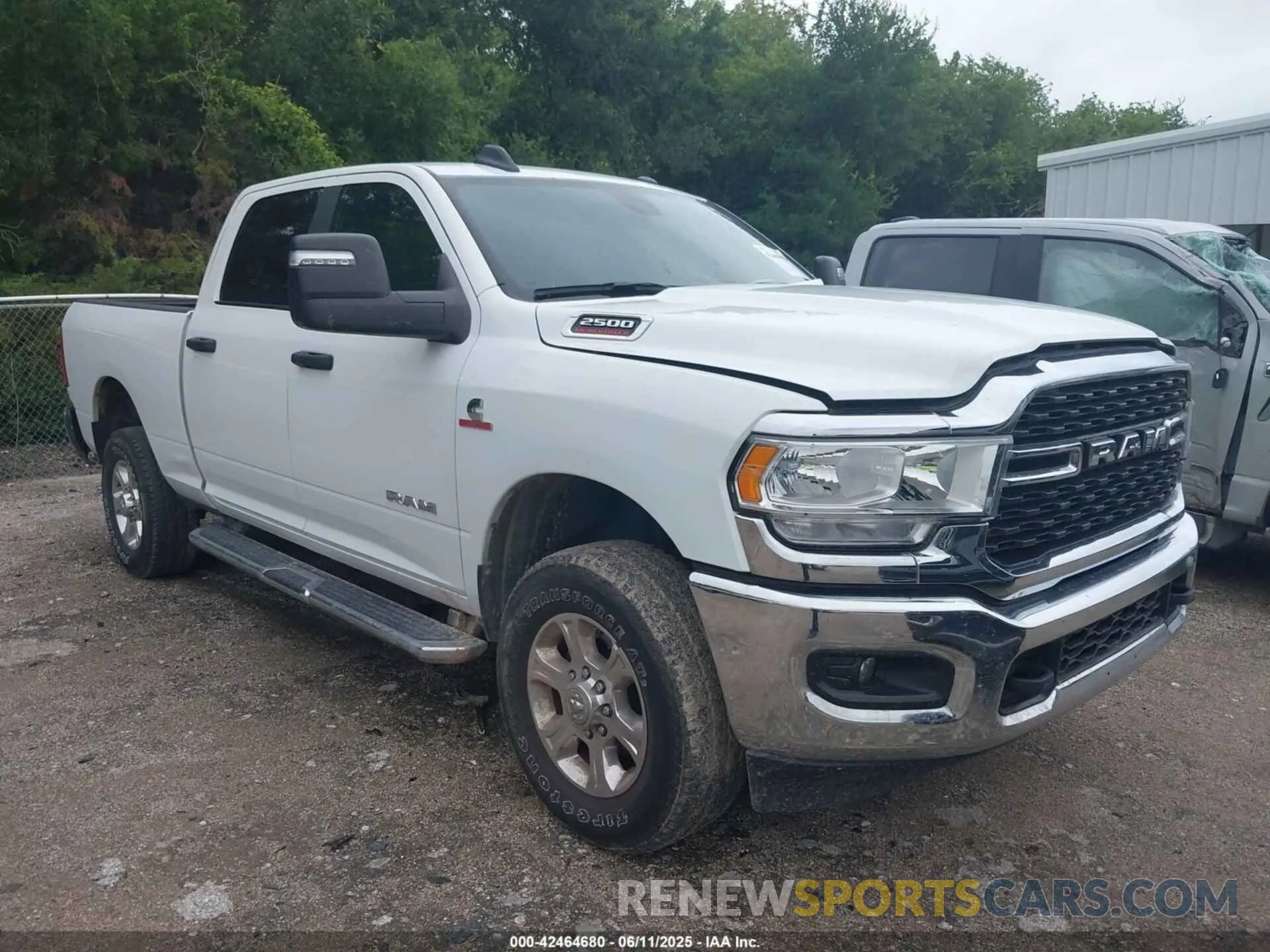 1 Photograph of a damaged car 3C6UR5DL9RG286018 RAM 2500 2024