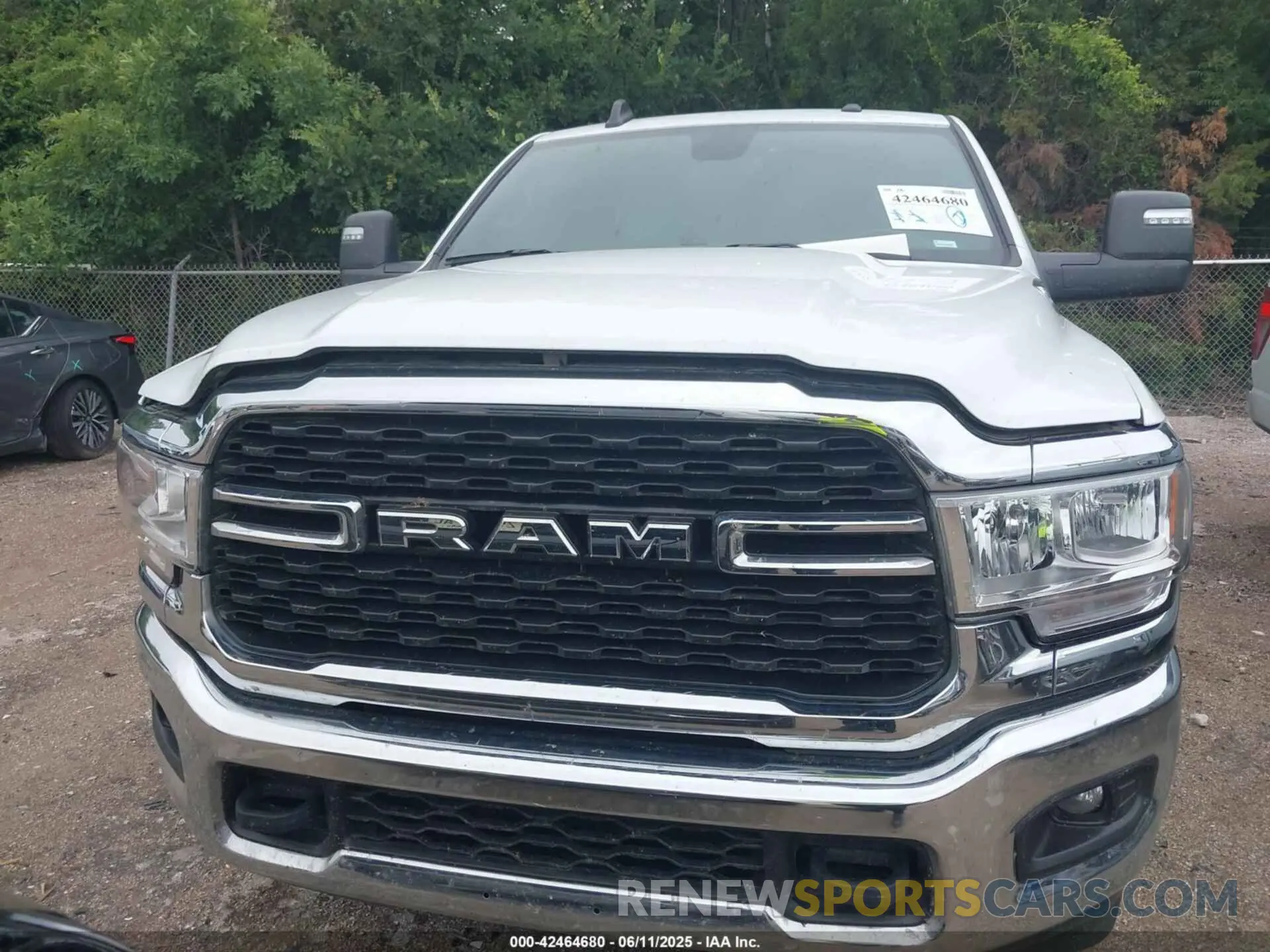 12 Photograph of a damaged car 3C6UR5DL9RG286018 RAM 2500 2024