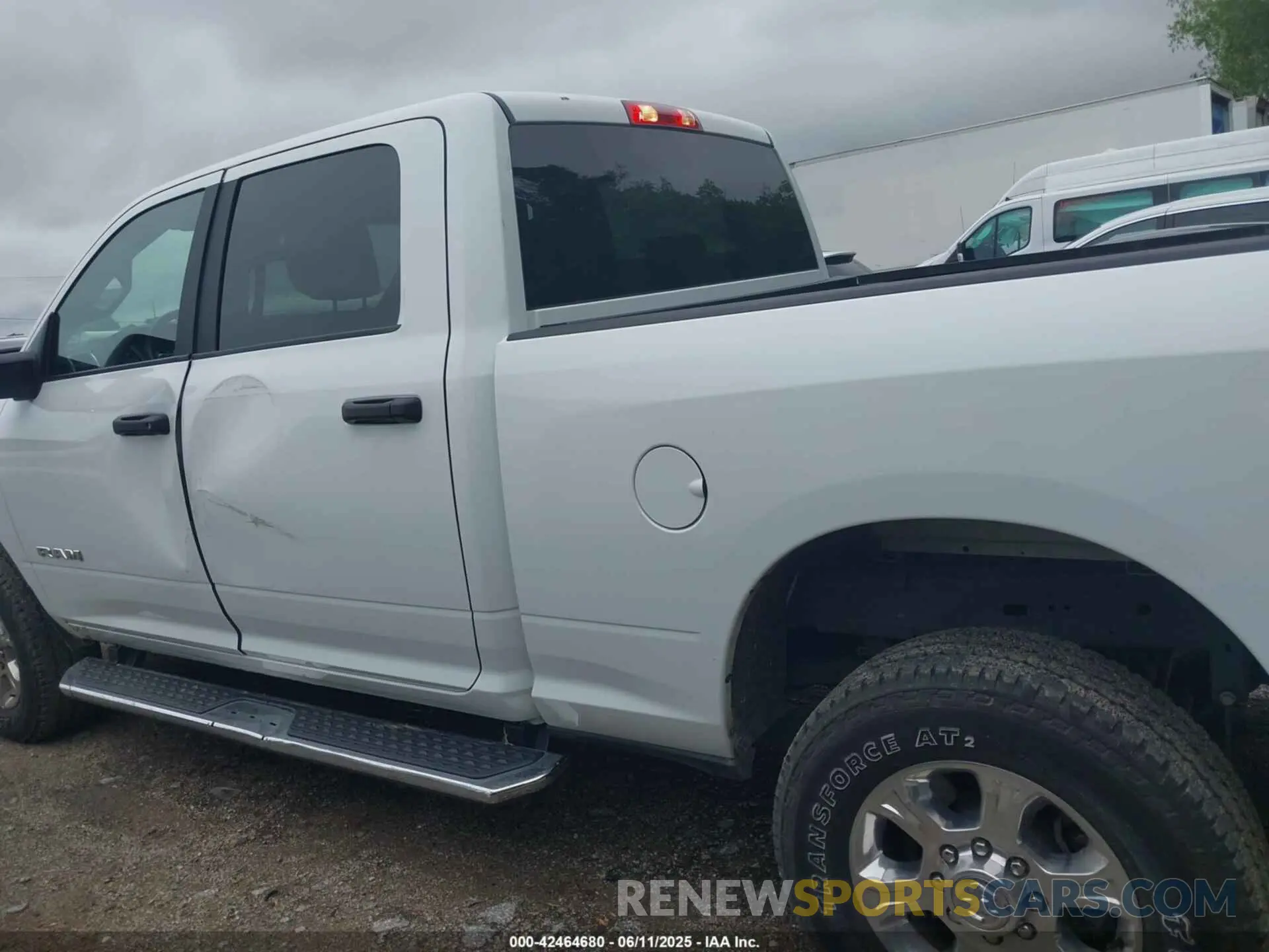 14 Photograph of a damaged car 3C6UR5DL9RG286018 RAM 2500 2024