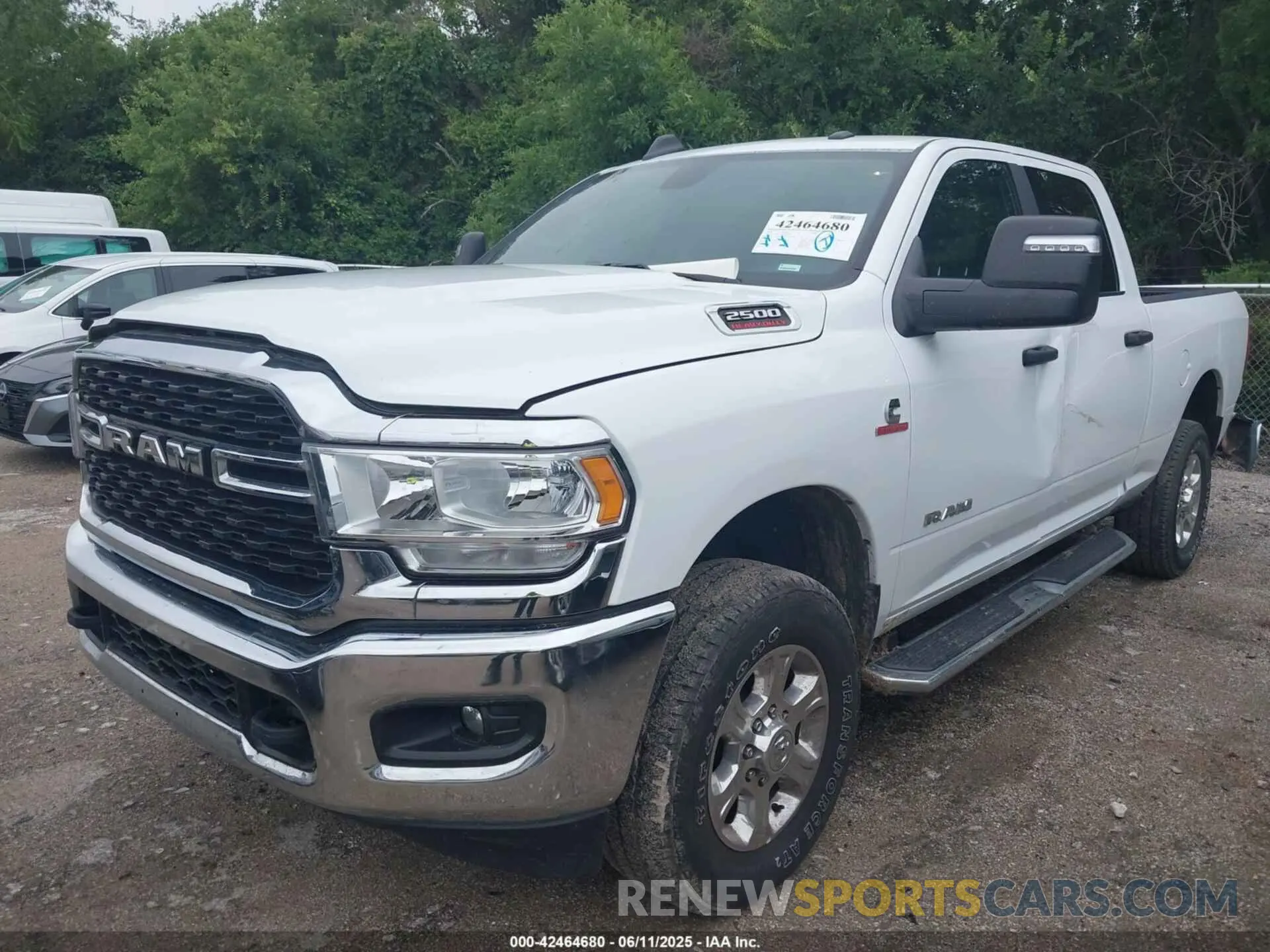 2 Photograph of a damaged car 3C6UR5DL9RG286018 RAM 2500 2024