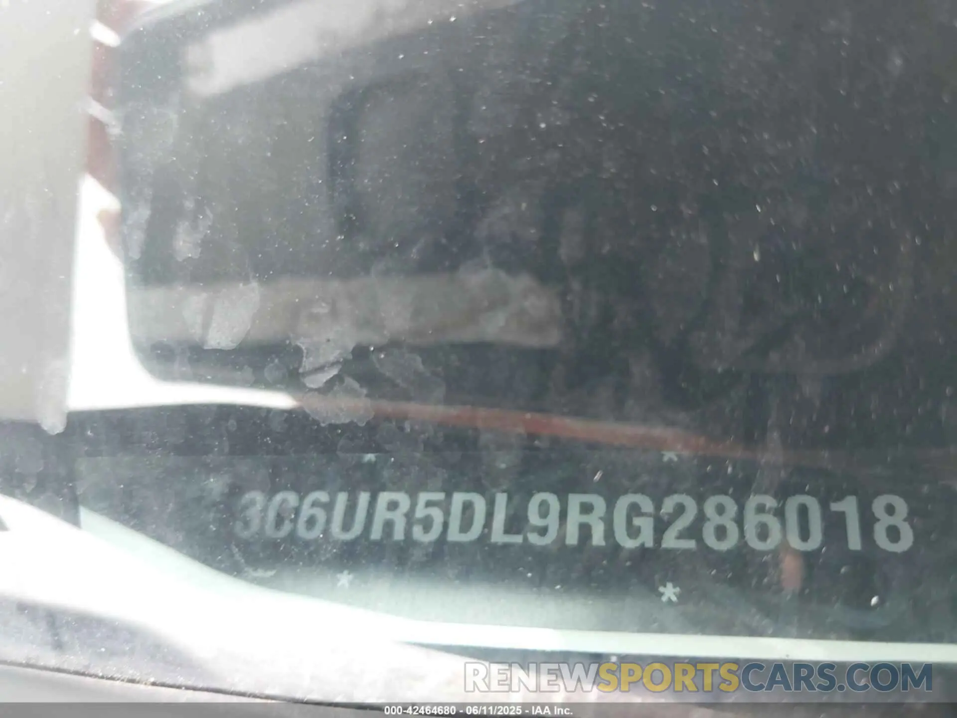 9 Photograph of a damaged car 3C6UR5DL9RG286018 RAM 2500 2024