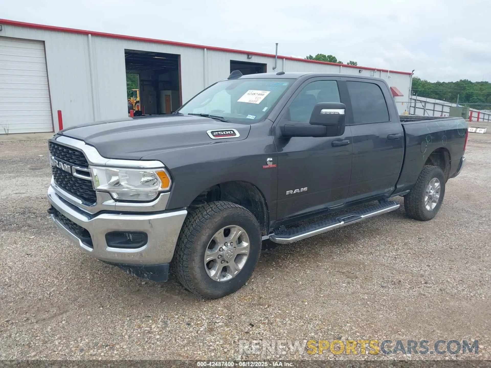 2 Photograph of a damaged car 3C6UR5DL9RG291459 RAM 2500 2024
