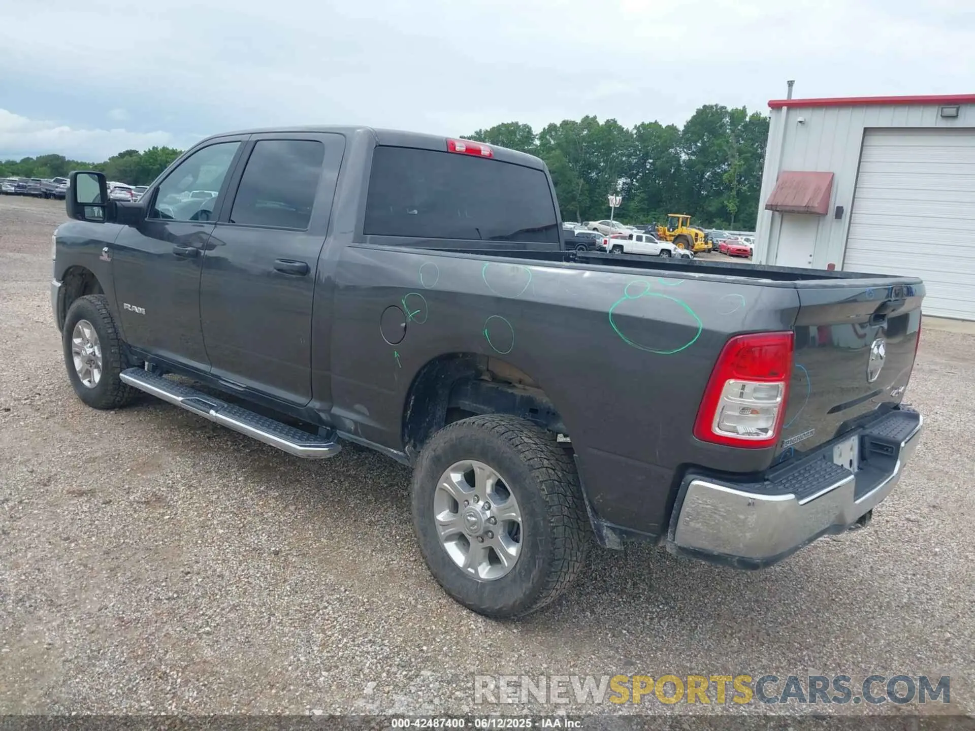 3 Photograph of a damaged car 3C6UR5DL9RG291459 RAM 2500 2024