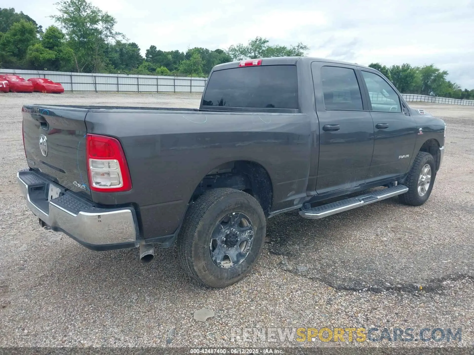 4 Photograph of a damaged car 3C6UR5DL9RG291459 RAM 2500 2024