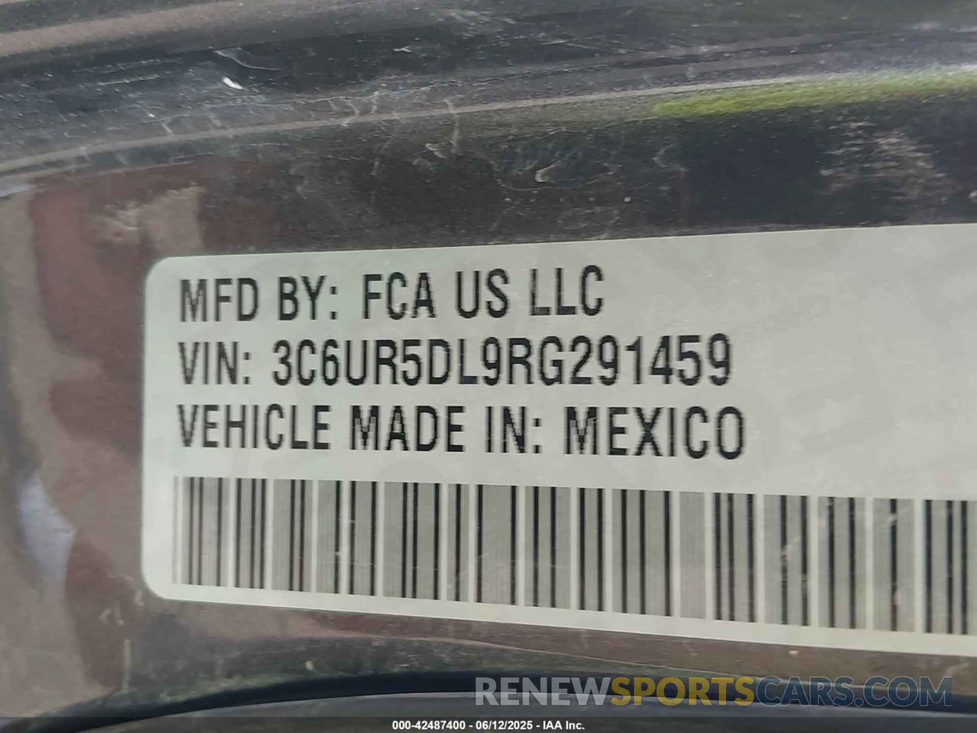 9 Photograph of a damaged car 3C6UR5DL9RG291459 RAM 2500 2024