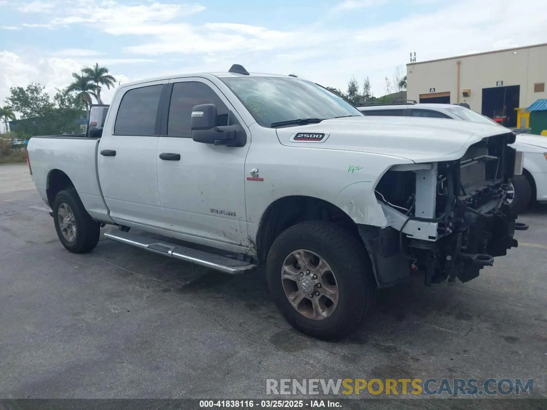 1 Photograph of a damaged car 3C6UR5DL9RG297746 RAM 2500 2024