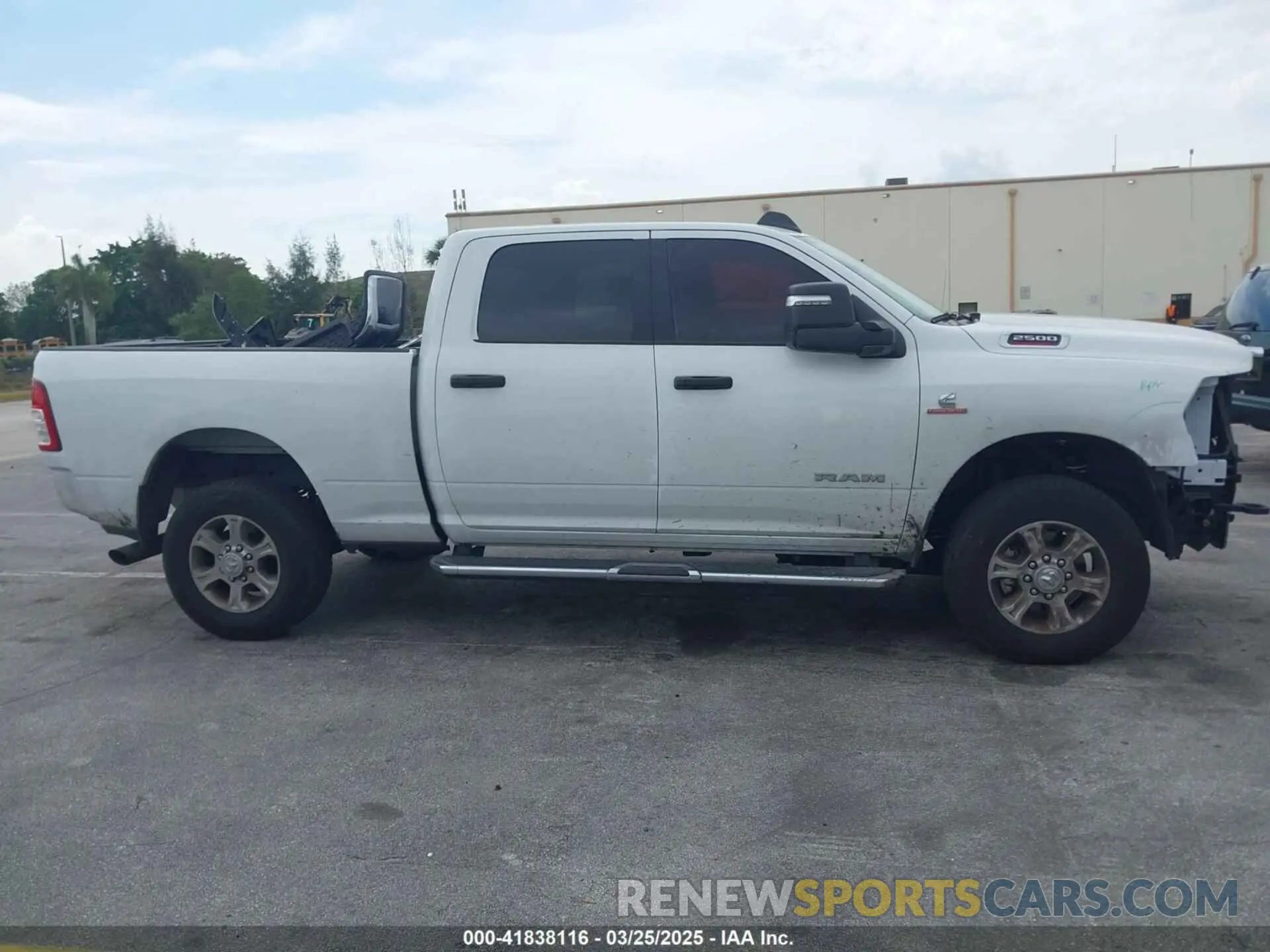 14 Photograph of a damaged car 3C6UR5DL9RG297746 RAM 2500 2024