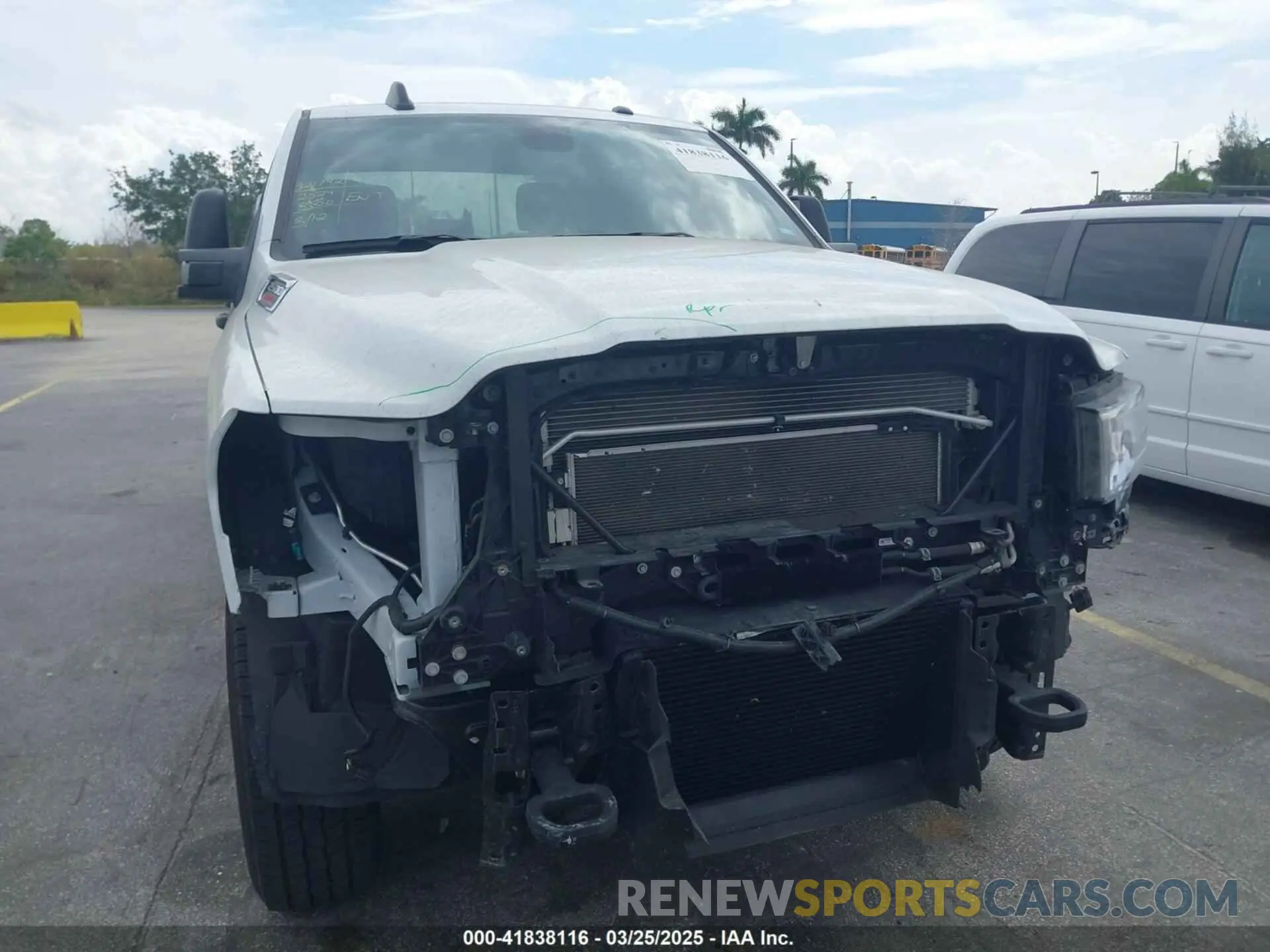 6 Photograph of a damaged car 3C6UR5DL9RG297746 RAM 2500 2024
