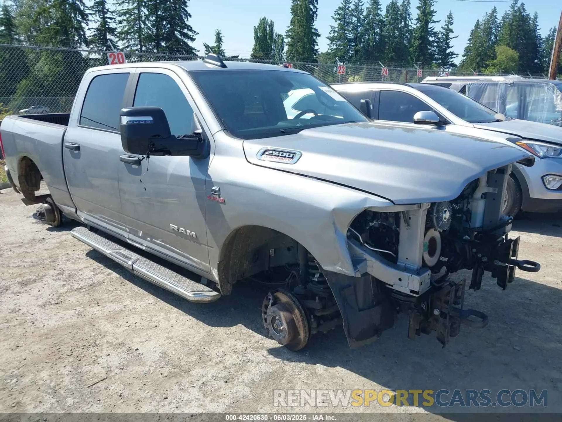 1 Photograph of a damaged car 3C6UR5DL9RG303108 RAM 2500 2024