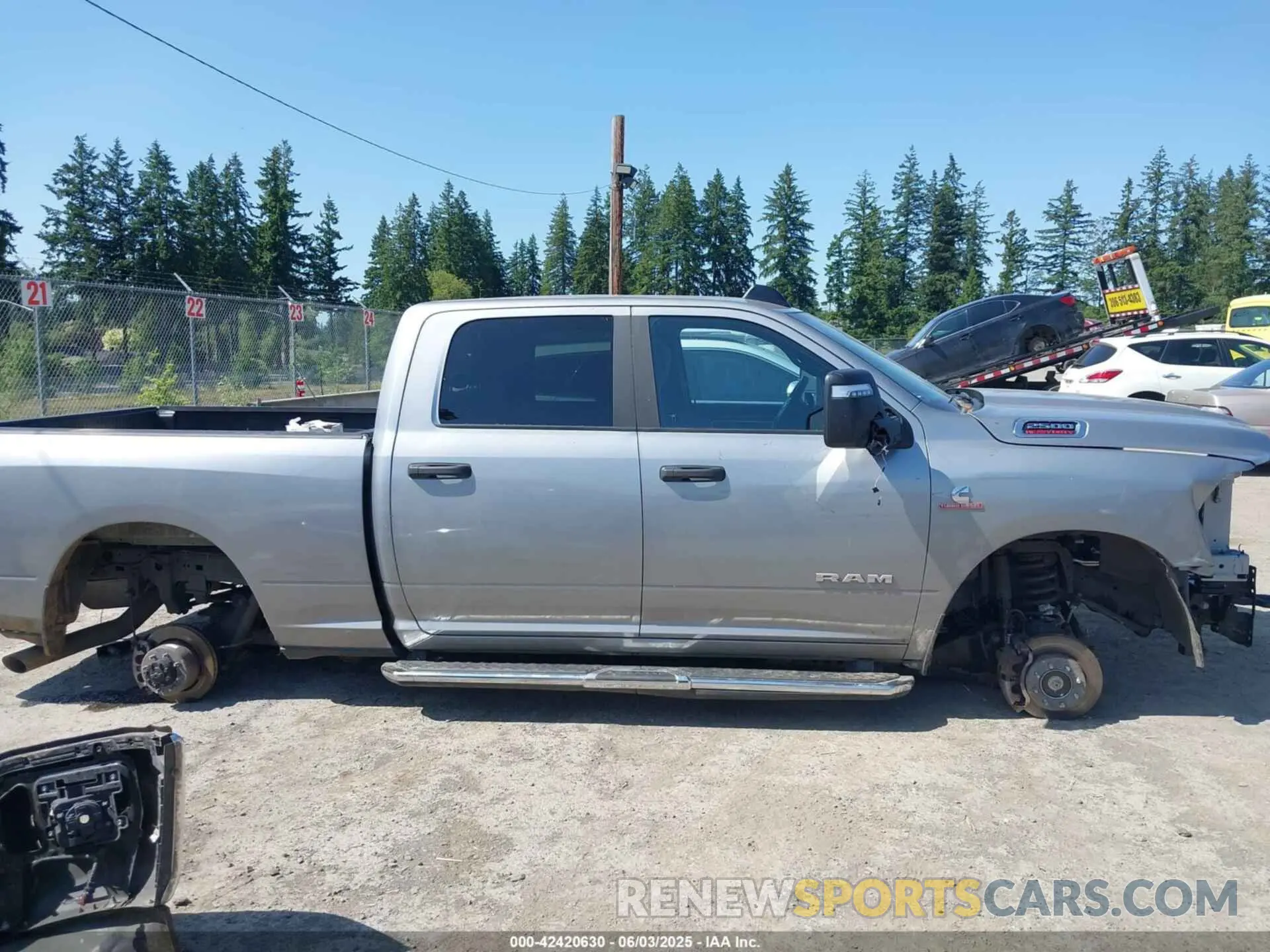 13 Photograph of a damaged car 3C6UR5DL9RG303108 RAM 2500 2024
