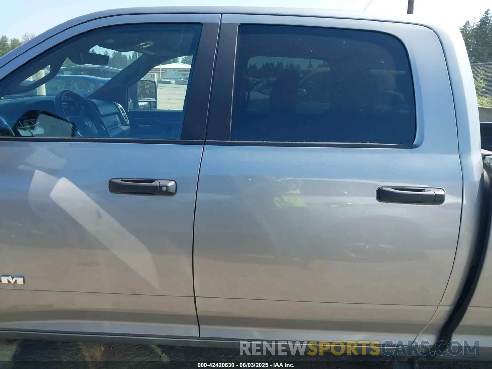 14 Photograph of a damaged car 3C6UR5DL9RG303108 RAM 2500 2024