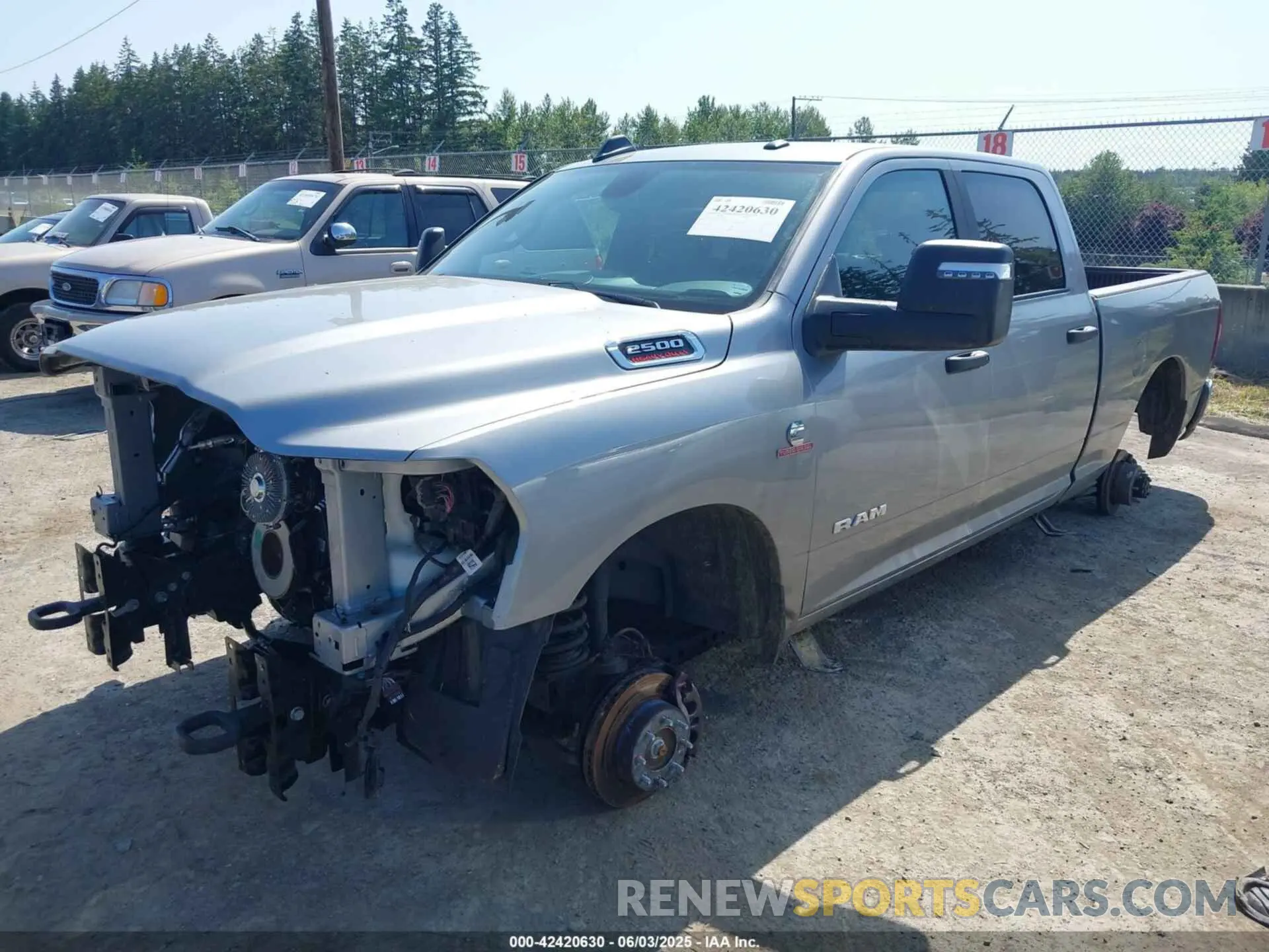 2 Photograph of a damaged car 3C6UR5DL9RG303108 RAM 2500 2024