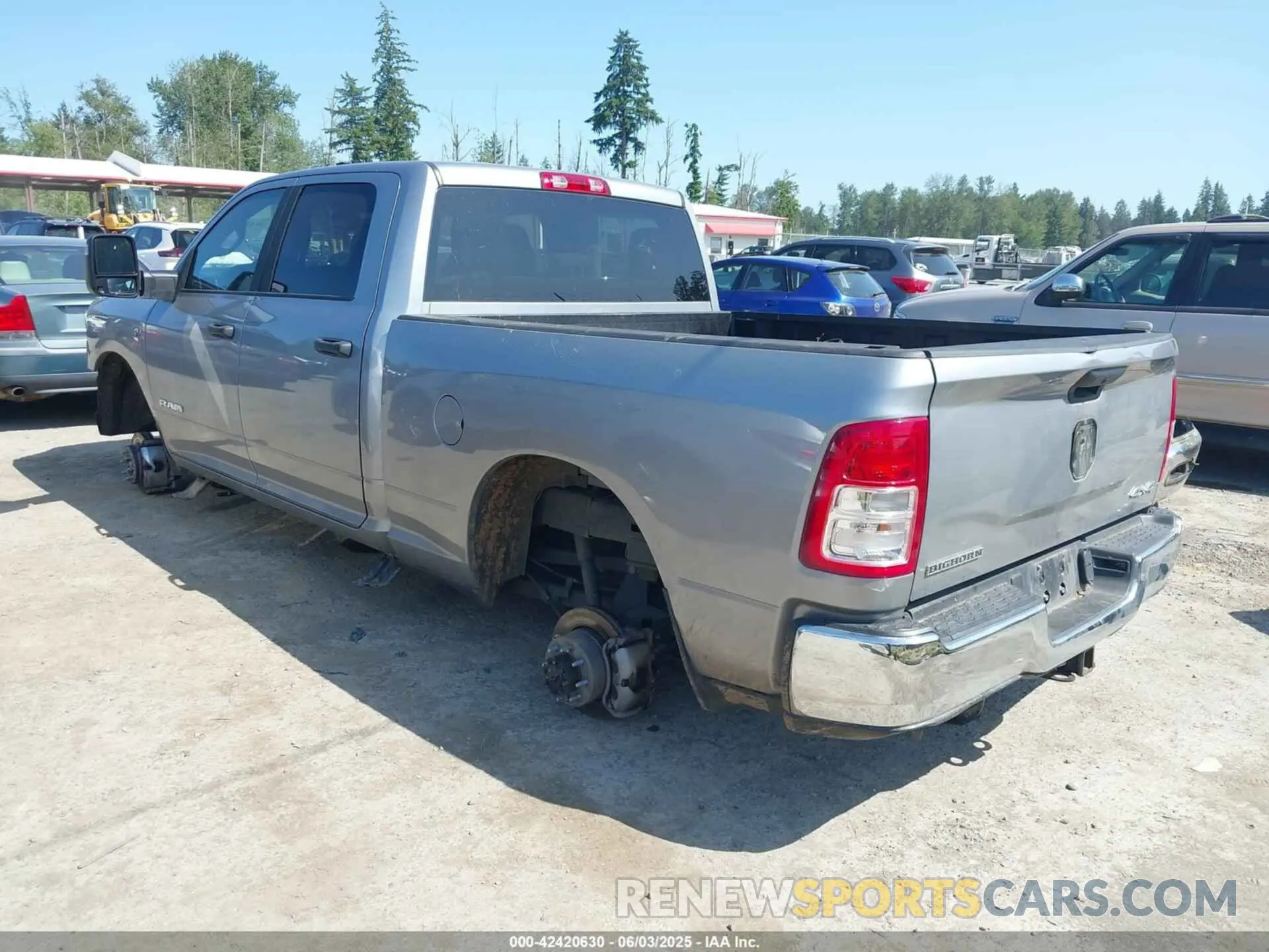 3 Photograph of a damaged car 3C6UR5DL9RG303108 RAM 2500 2024