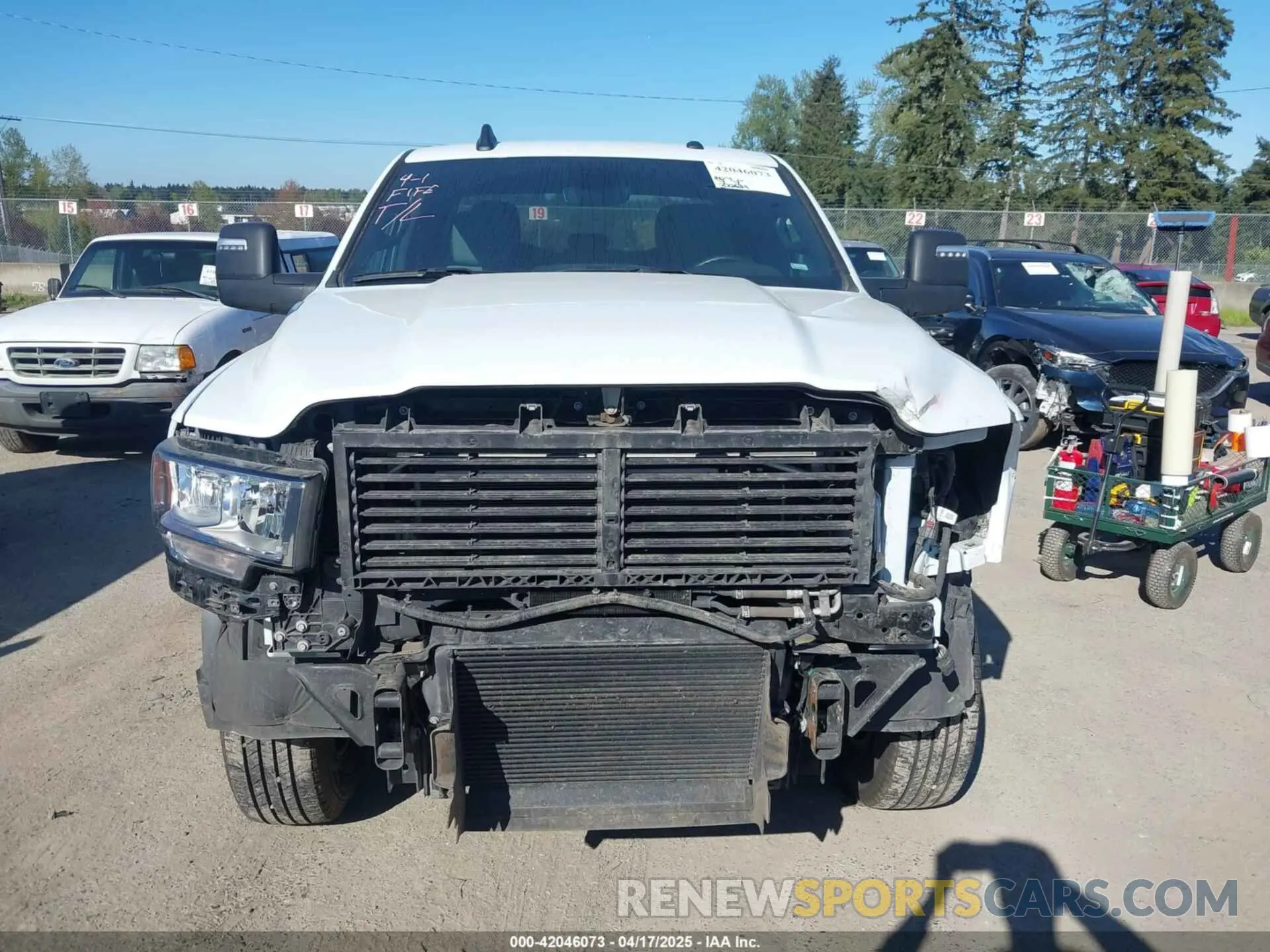 13 Photograph of a damaged car 3C6UR5DL9RG303433 RAM 2500 2024