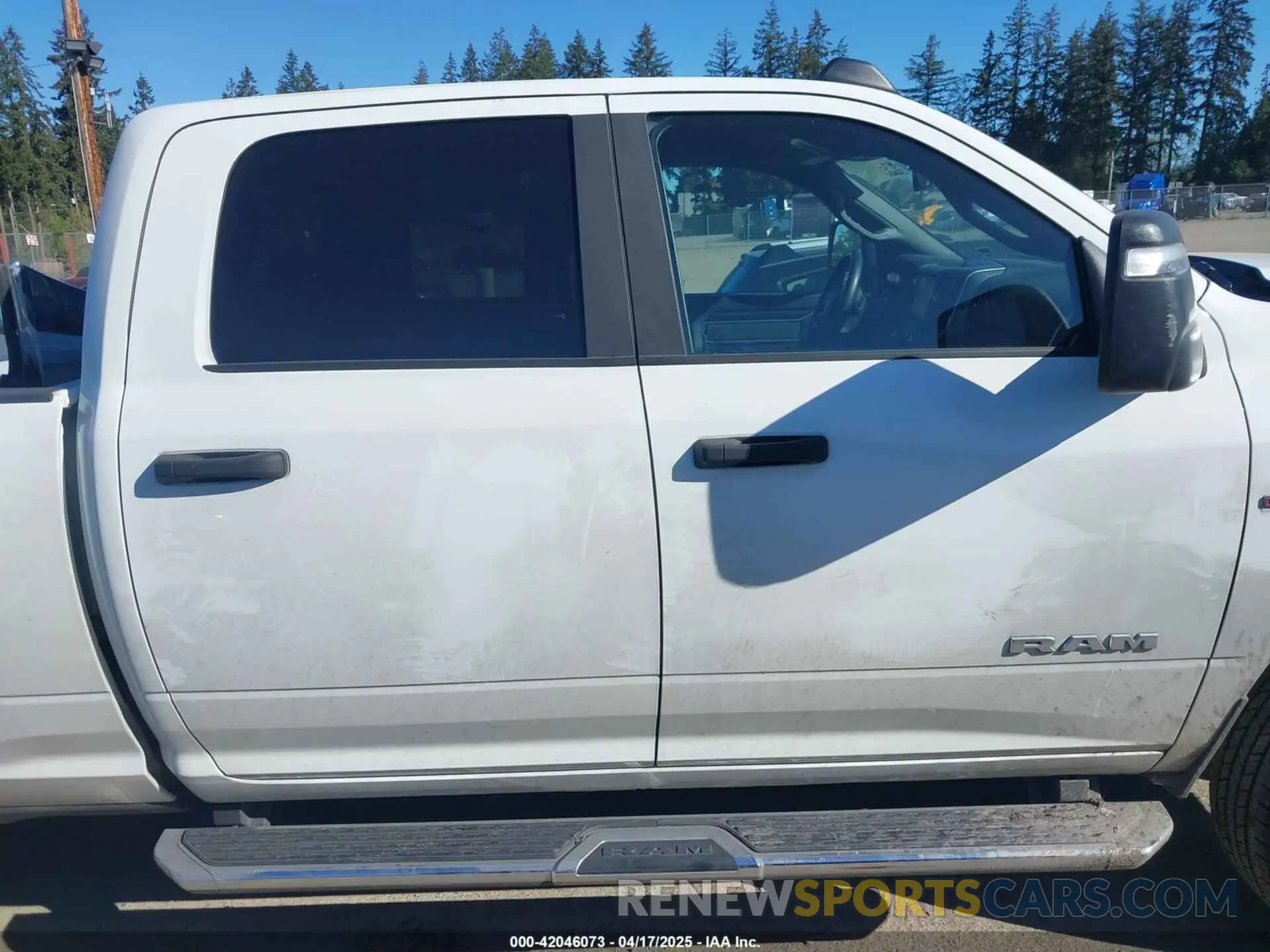 14 Photograph of a damaged car 3C6UR5DL9RG303433 RAM 2500 2024