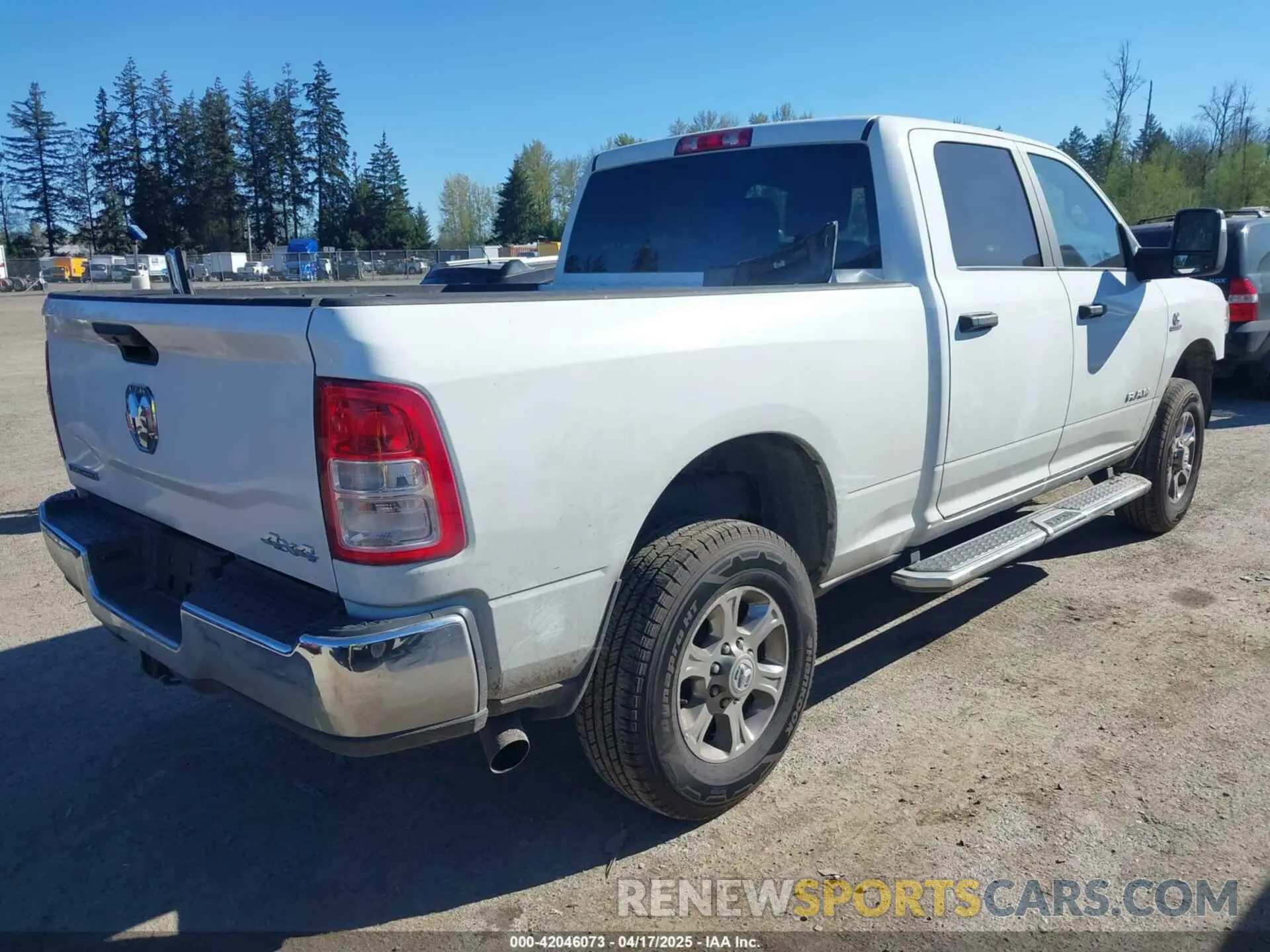 4 Photograph of a damaged car 3C6UR5DL9RG303433 RAM 2500 2024