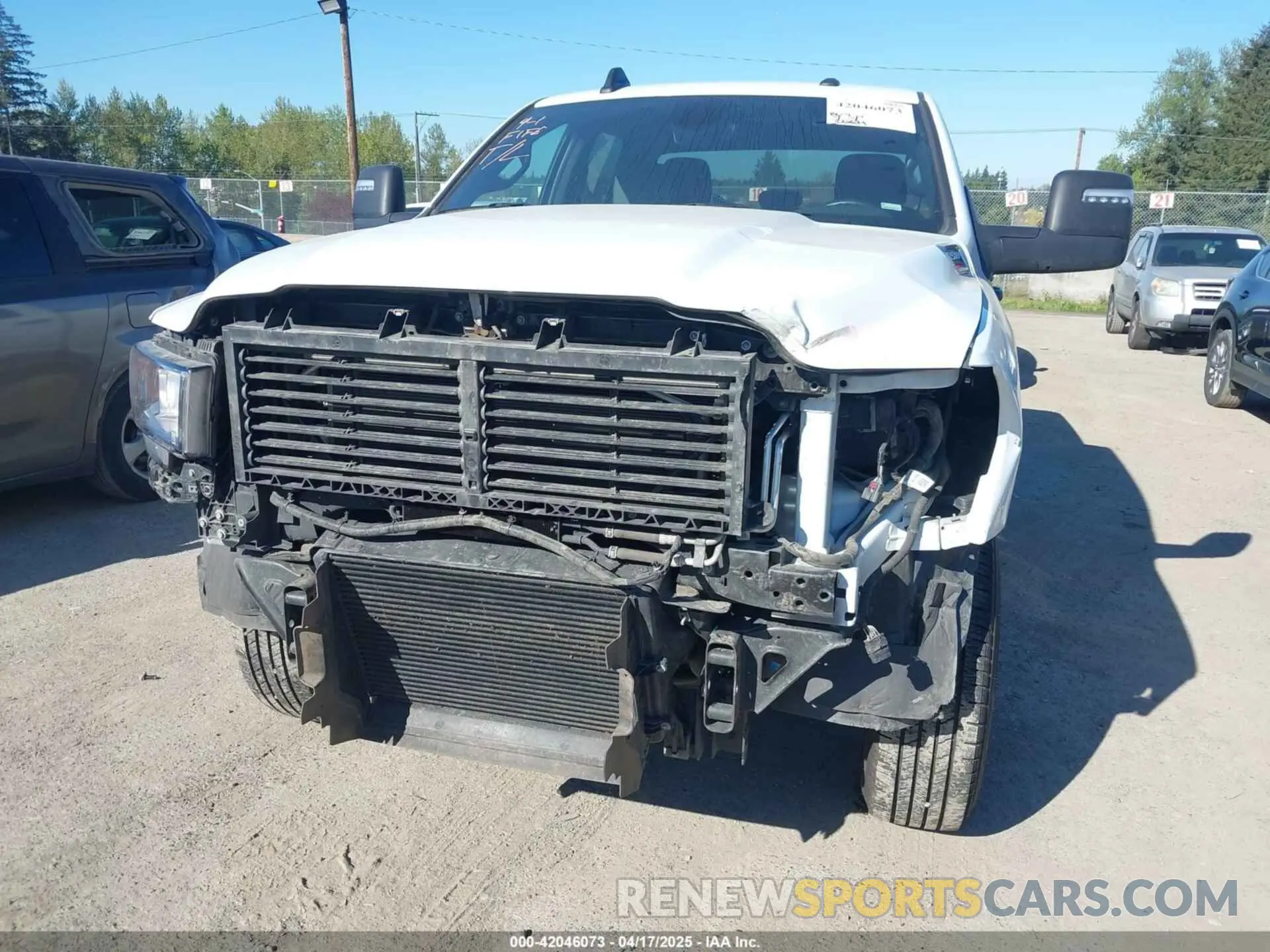 6 Photograph of a damaged car 3C6UR5DL9RG303433 RAM 2500 2024
