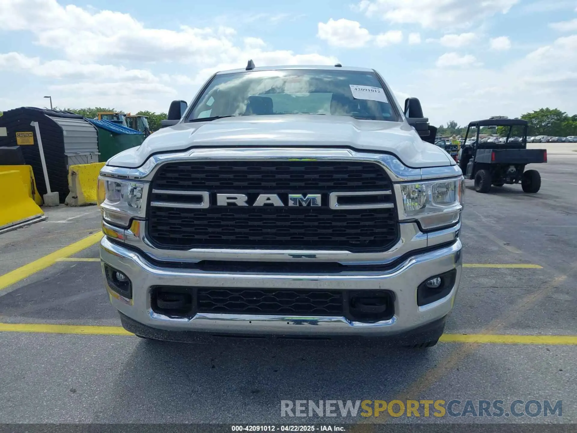 12 Photograph of a damaged car 3C6UR5DL9RG338196 RAM 2500 2024