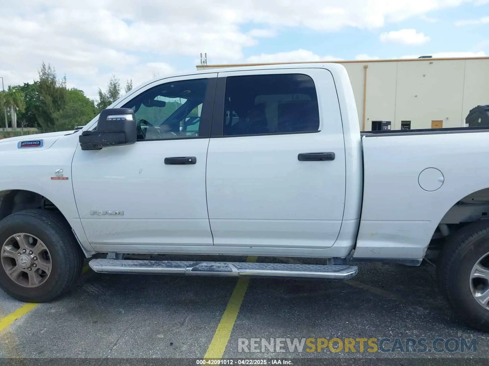 14 Photograph of a damaged car 3C6UR5DL9RG338196 RAM 2500 2024