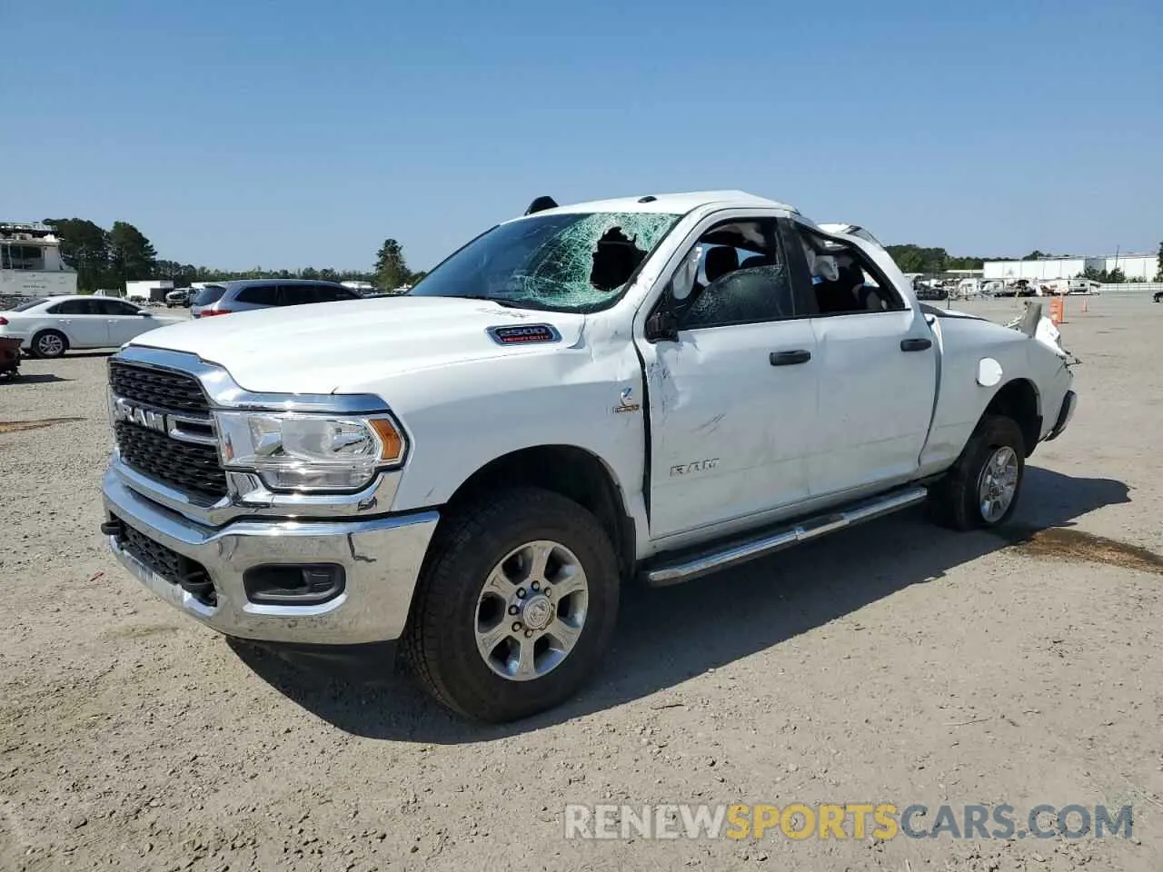 1 Photograph of a damaged car 3C6UR5DL9RG340644 RAM 2500 2024