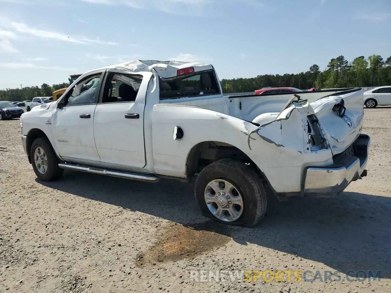 2 Photograph of a damaged car 3C6UR5DL9RG340644 RAM 2500 2024