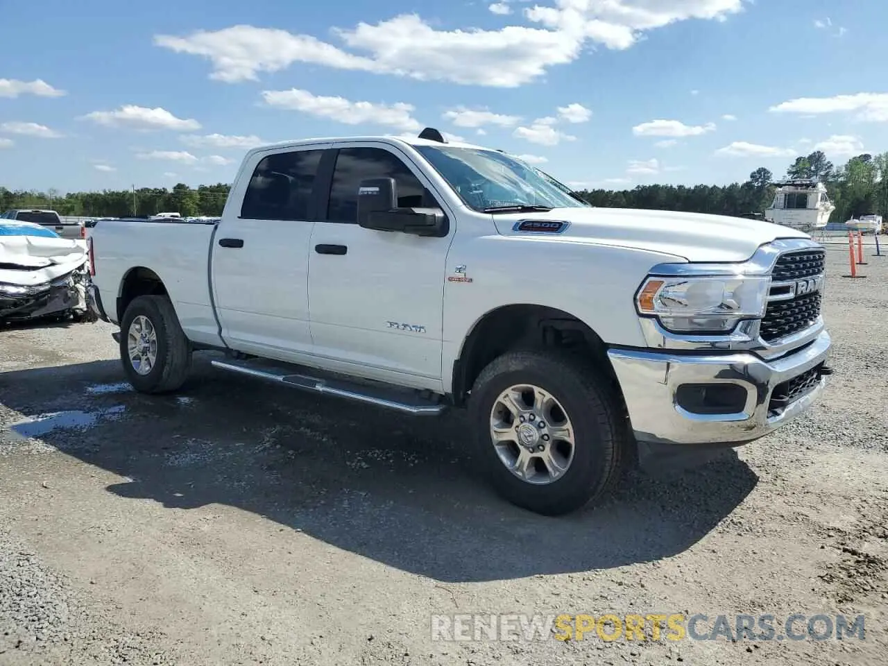 4 Photograph of a damaged car 3C6UR5DL9RG340644 RAM 2500 2024