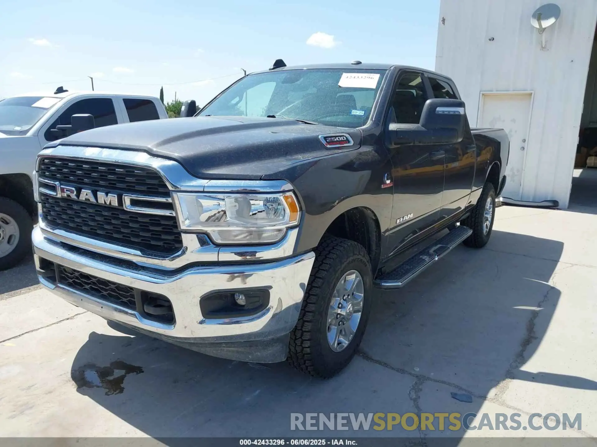 2 Photograph of a damaged car 3C6UR5DLXRG244764 RAM 2500 2024