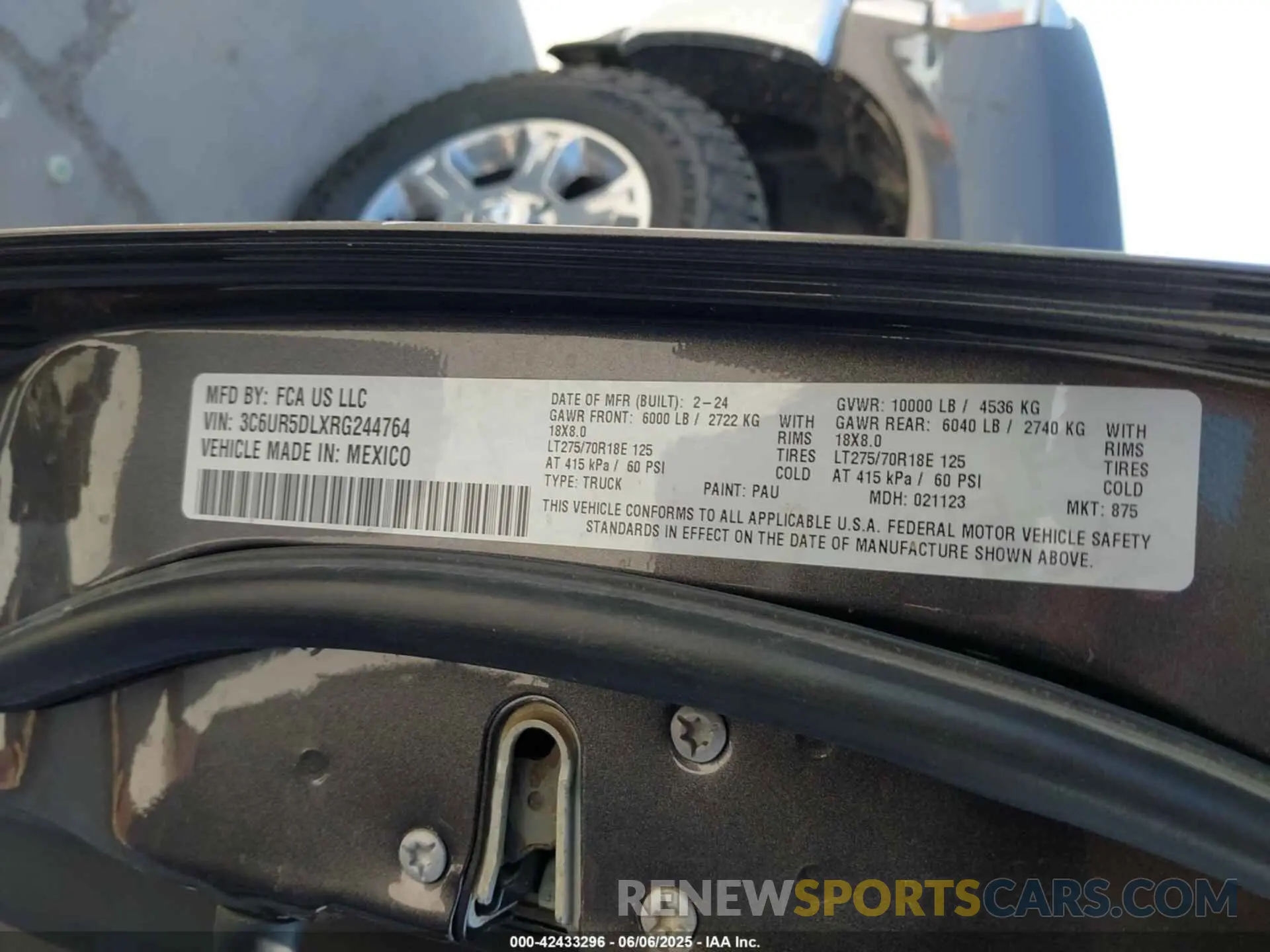 9 Photograph of a damaged car 3C6UR5DLXRG244764 RAM 2500 2024