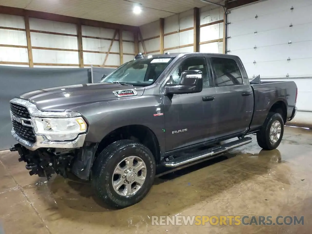 1 Photograph of a damaged car 3C6UR5DLXRG303277 RAM 2500 2024