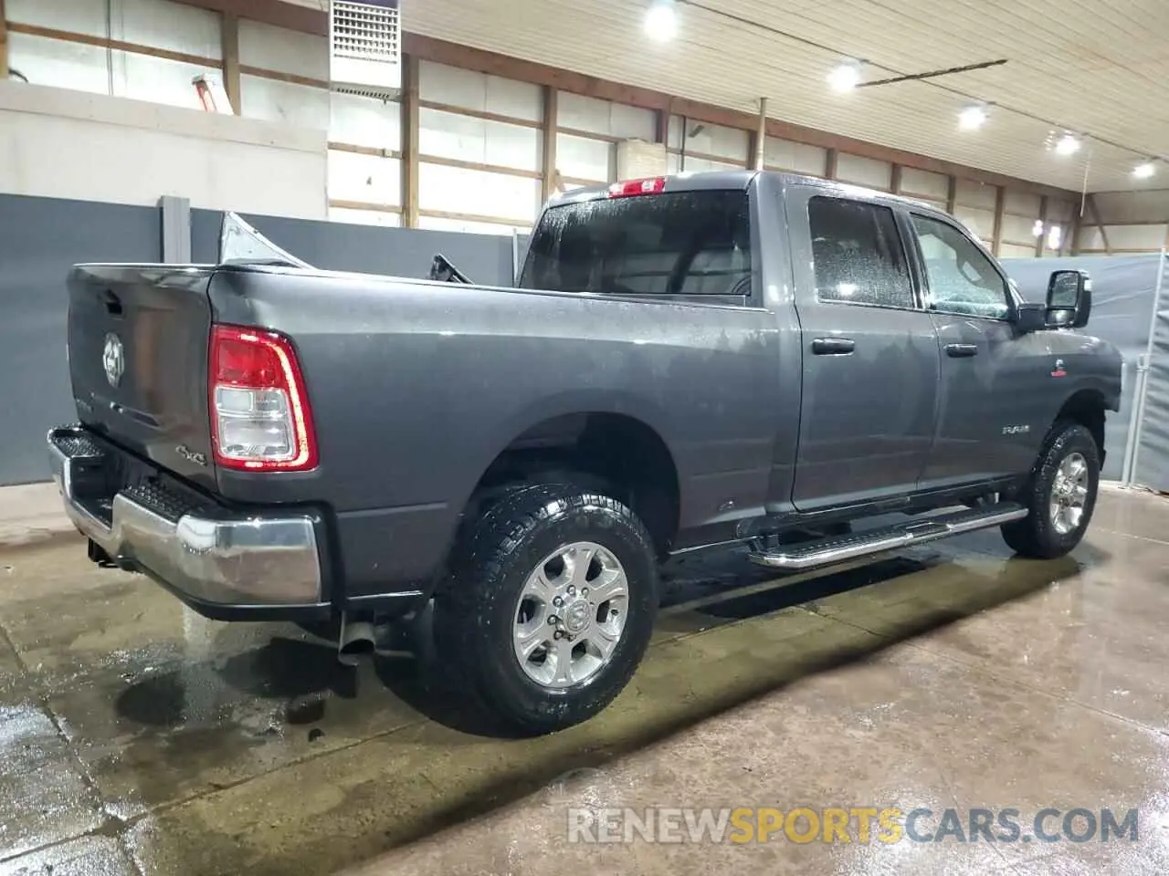 3 Photograph of a damaged car 3C6UR5DLXRG303277 RAM 2500 2024