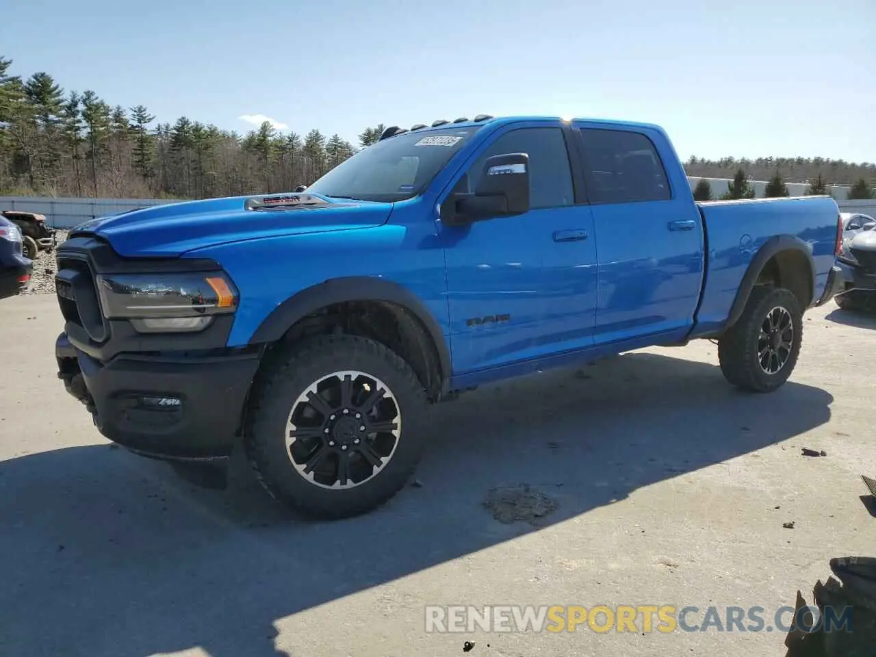 1 Photograph of a damaged car 3C6UR5EJ7RG140360 RAM 2500 2024