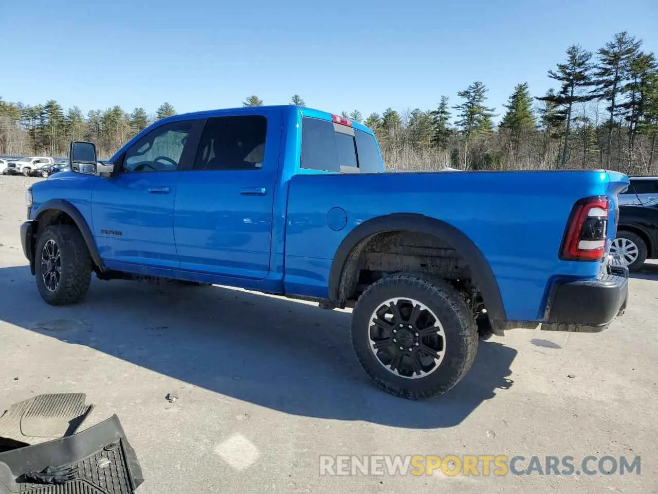 2 Photograph of a damaged car 3C6UR5EJ7RG140360 RAM 2500 2024